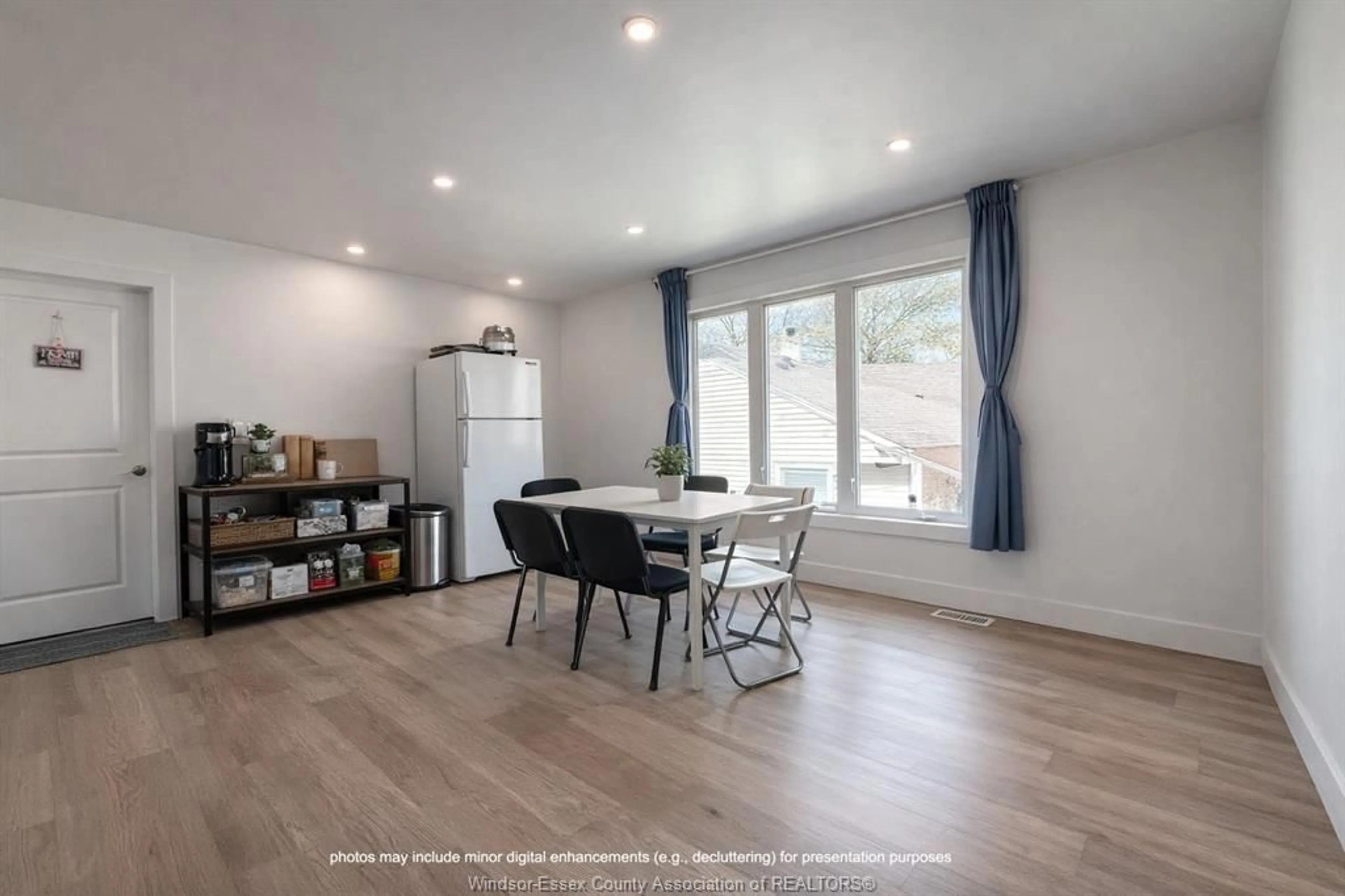 Open concept kitchen, wood/laminate floor for 788 BRIDGE Ave, Windsor Ontario N9B 2M6