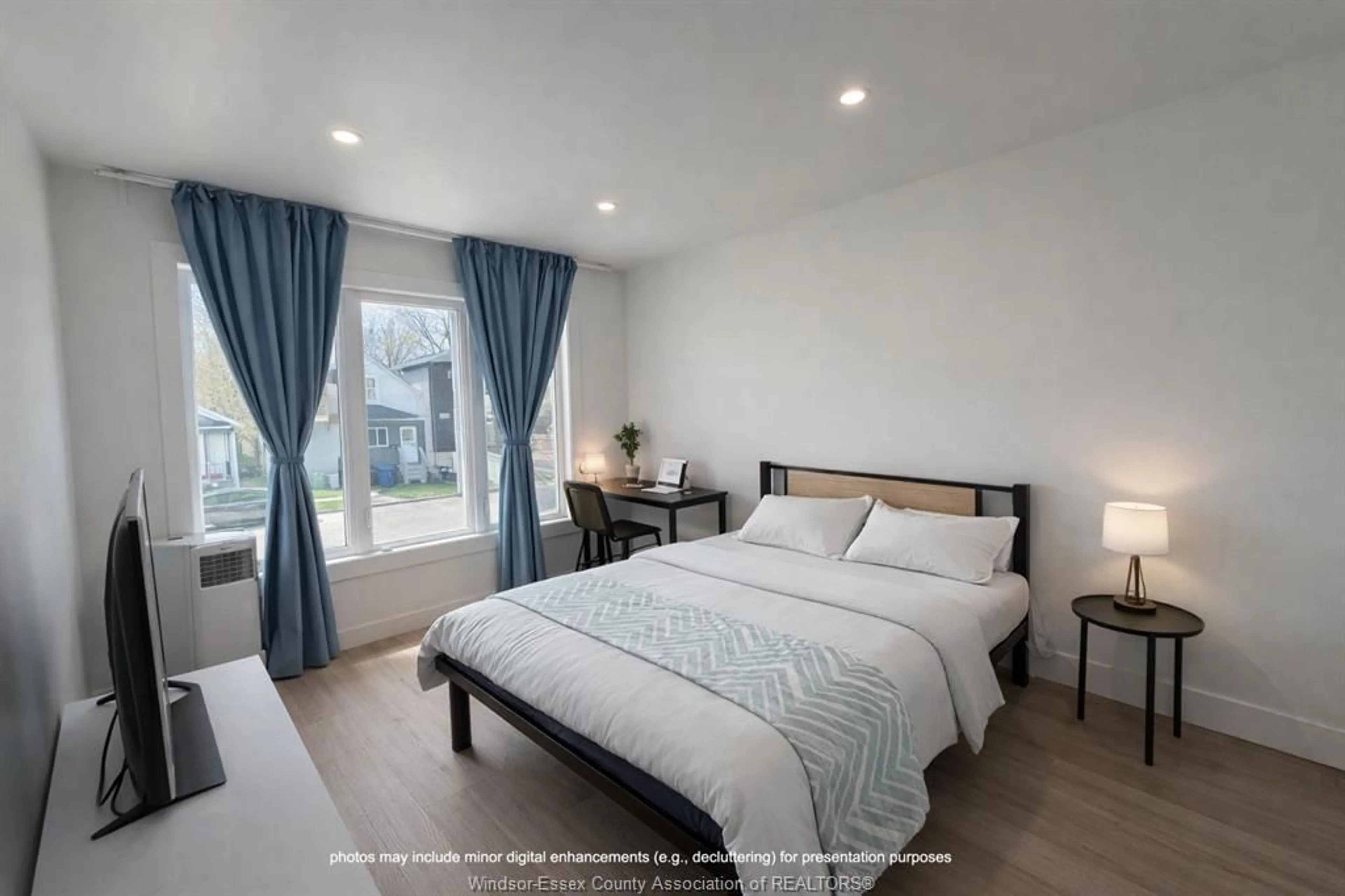 Bedroom with bed, wood/laminate floor for 788 BRIDGE Ave, Windsor Ontario N9B 2M6