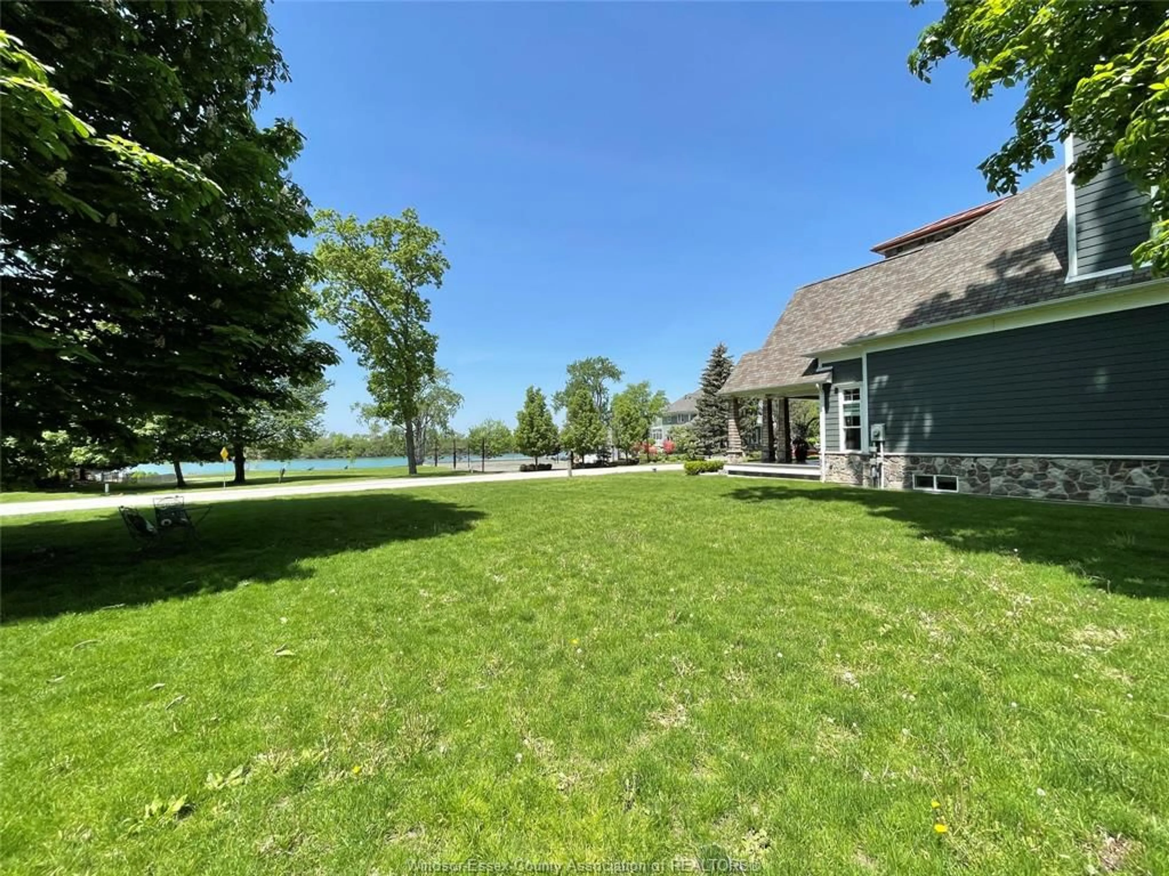 A pic from outside/outdoor area/front of a property/back of a property/a pic from drone, water/lake/river/ocean view for 329 Crystal Bay Drive, Amherstburg Ontario N9V 4A7