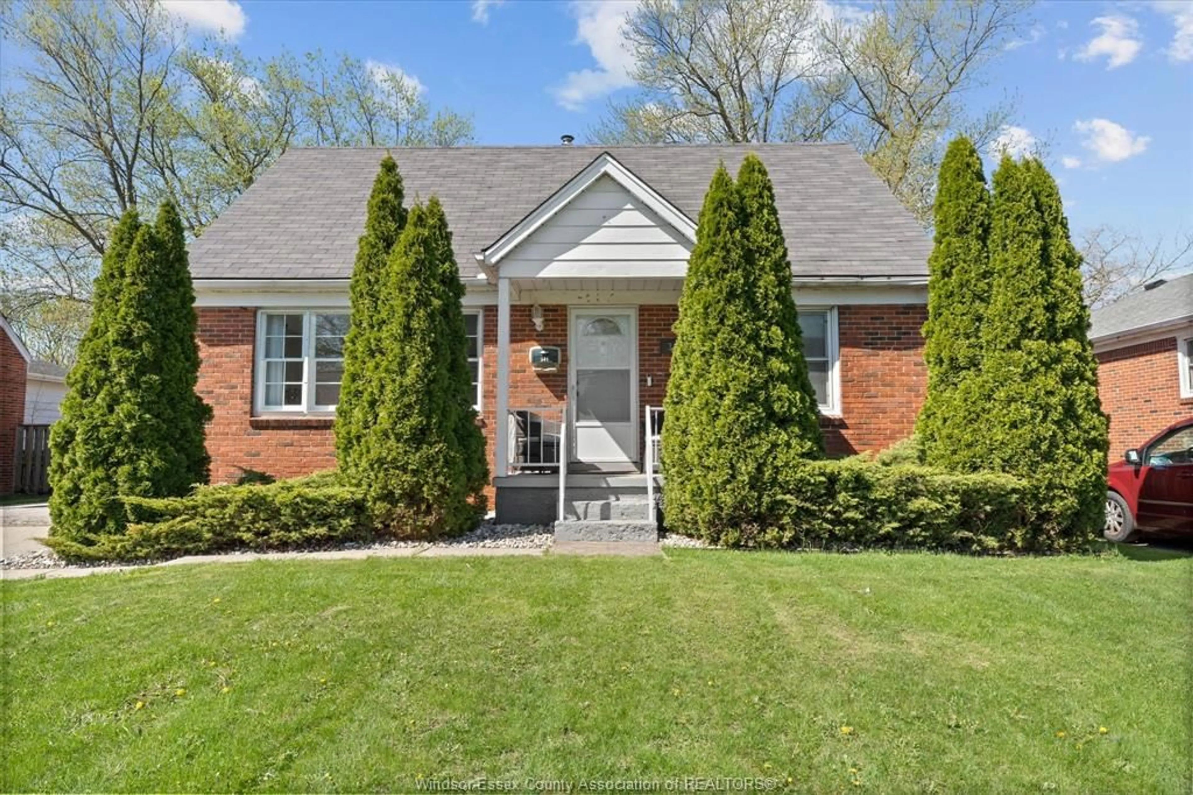 Home with brick exterior material, street for 341 LAUZON Rd, Windsor Ontario N8S 3M1