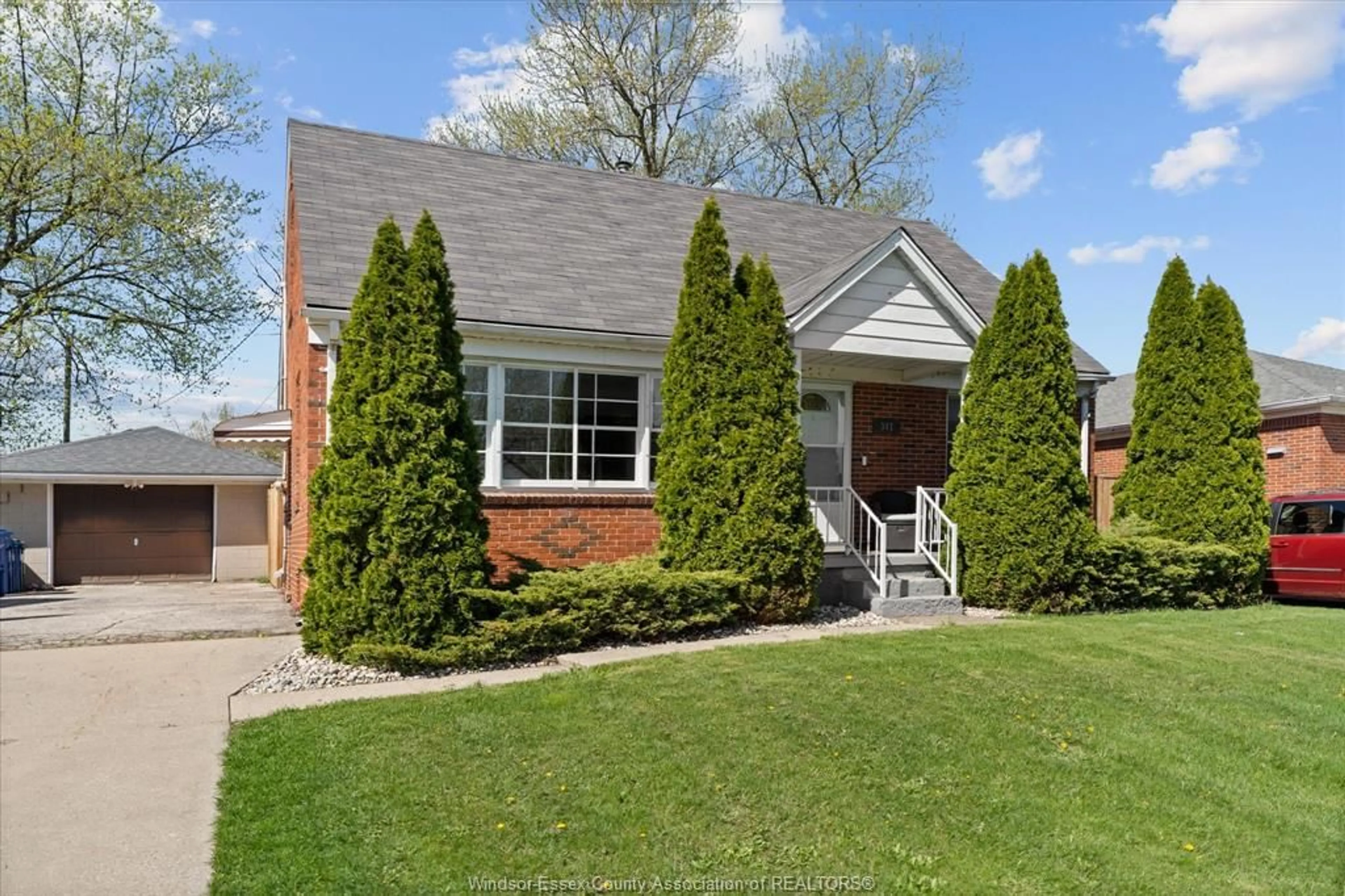 Home with brick exterior material, street for 341 LAUZON Rd, Windsor Ontario N8S 3M1