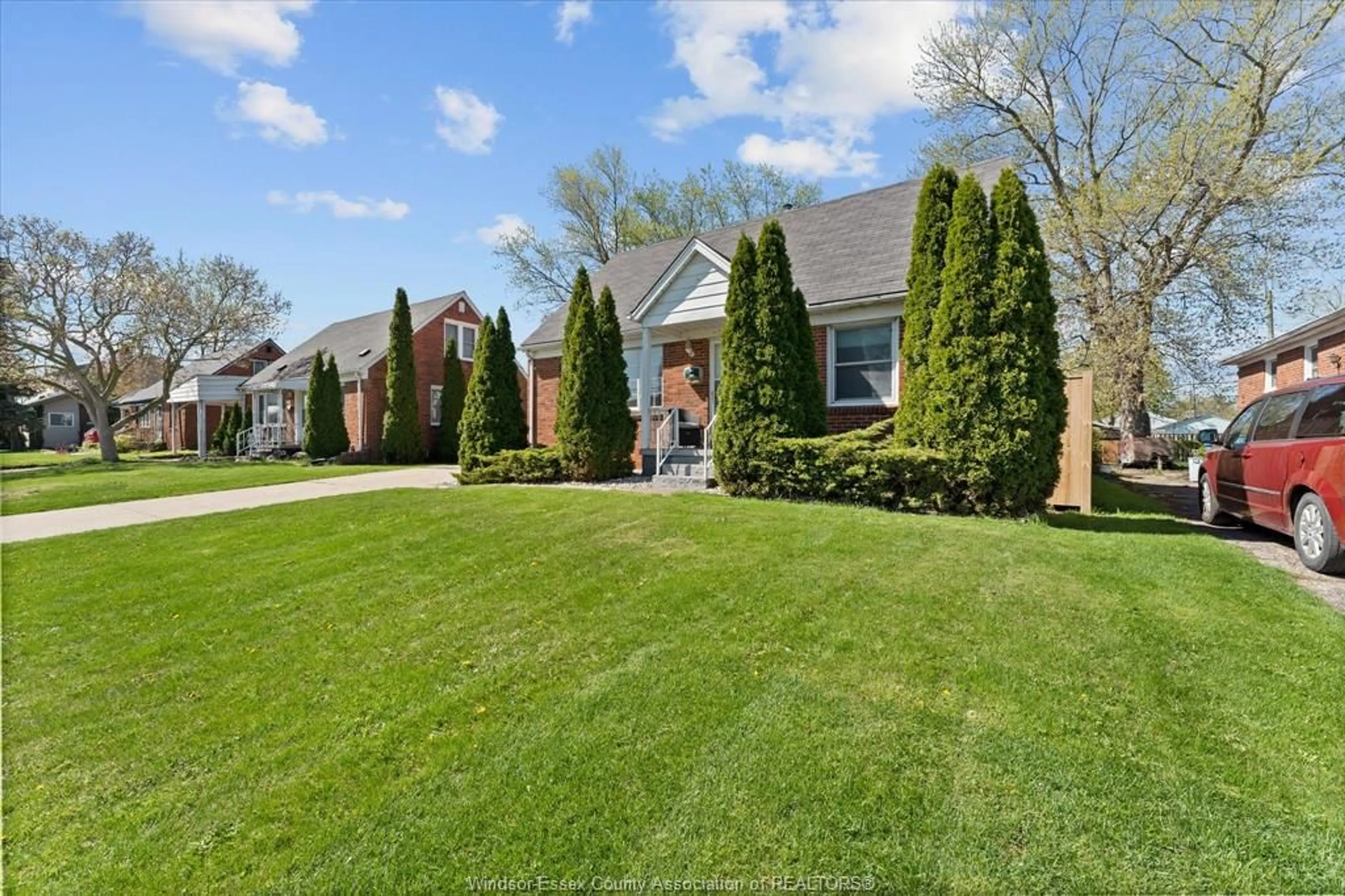 Home with brick exterior material, street for 341 LAUZON Rd, Windsor Ontario N8S 3M1