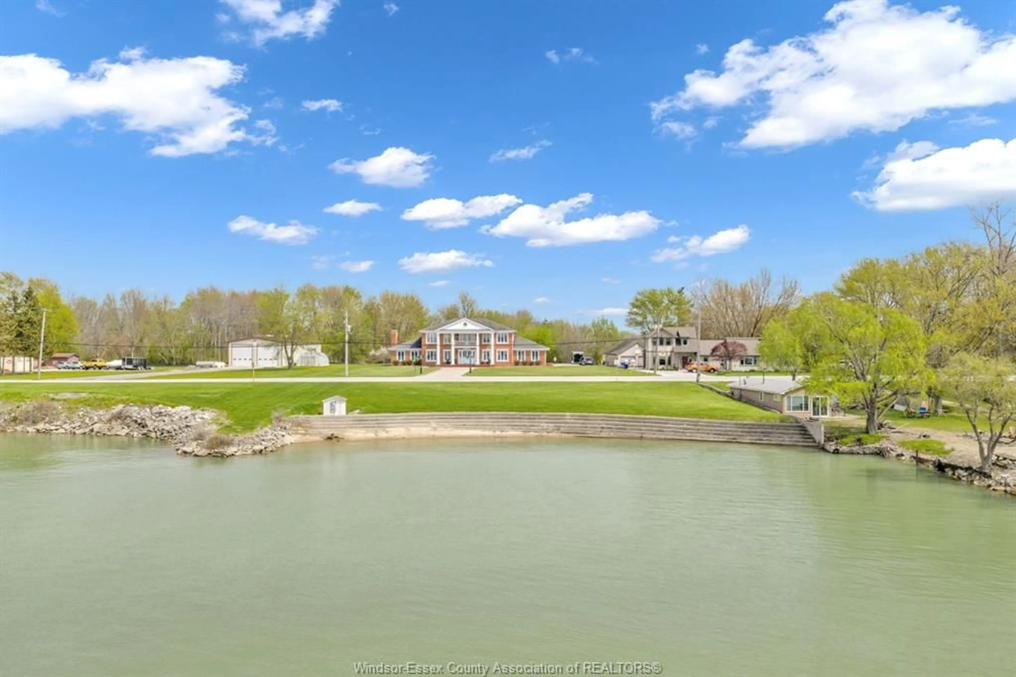 A pic from outside/outdoor area/front of a property/back of a property/a pic from drone, water/lake/river/ocean view for 883 Front Rd, Amherstburg Ontario N9V 2M4