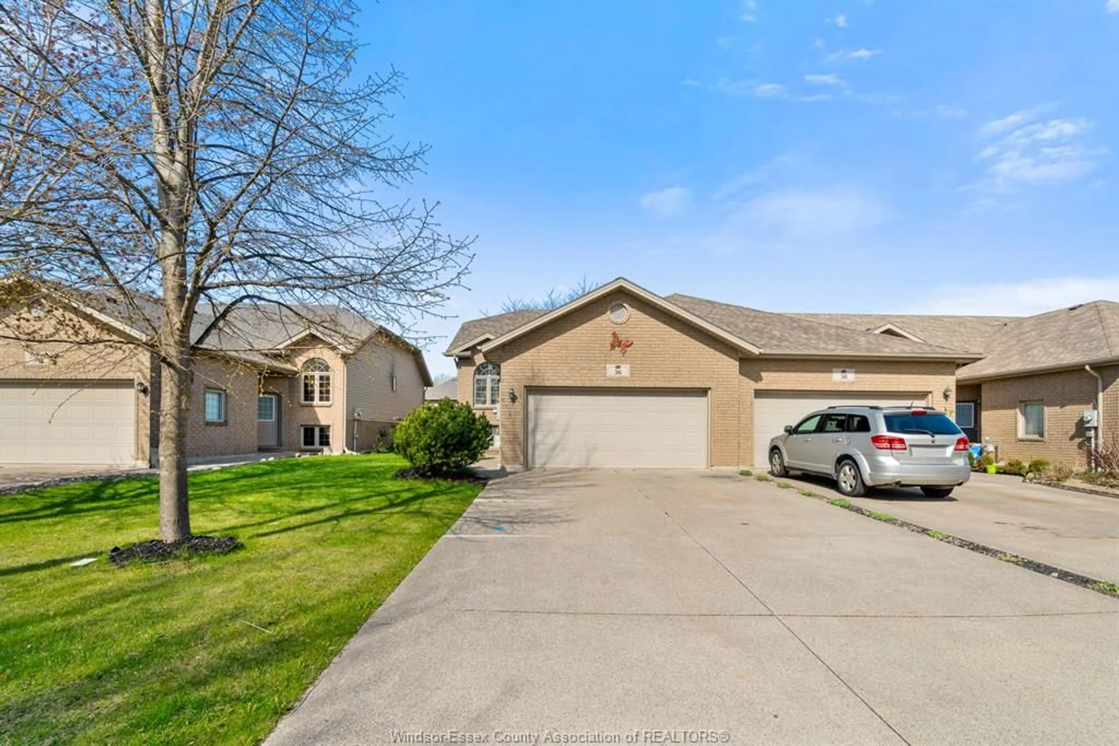 A pic from outside/outdoor area/front of a property/back of a property/a pic from drone, street for 56 ANFRED St, Leamington Ontario N8H 5L3