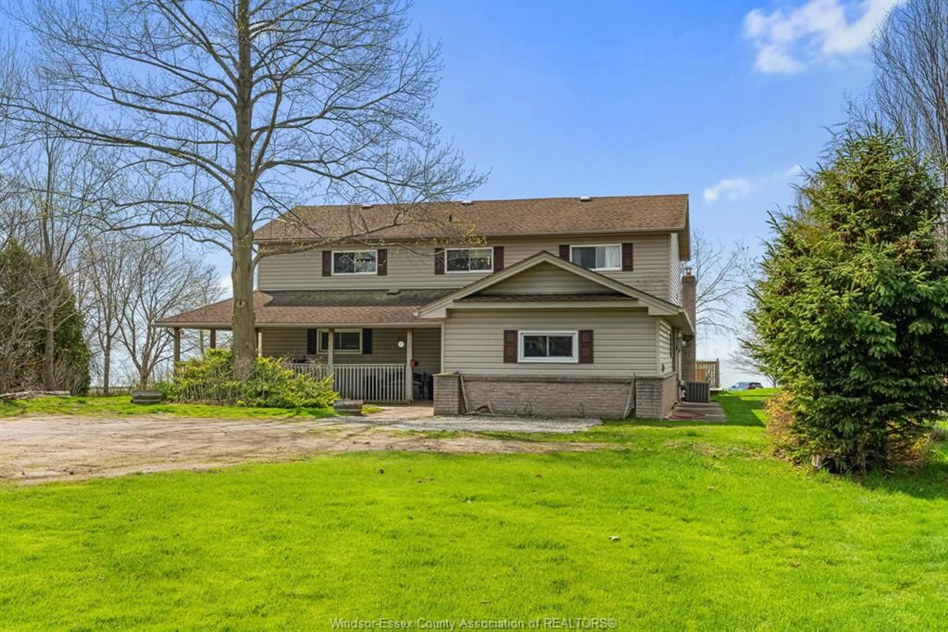 A pic from outside/outdoor area/front of a property/back of a property/a pic from drone, water/lake/river/ocean view for 495 LAKE Dr, Kingsville Ontario N9Y 3S6