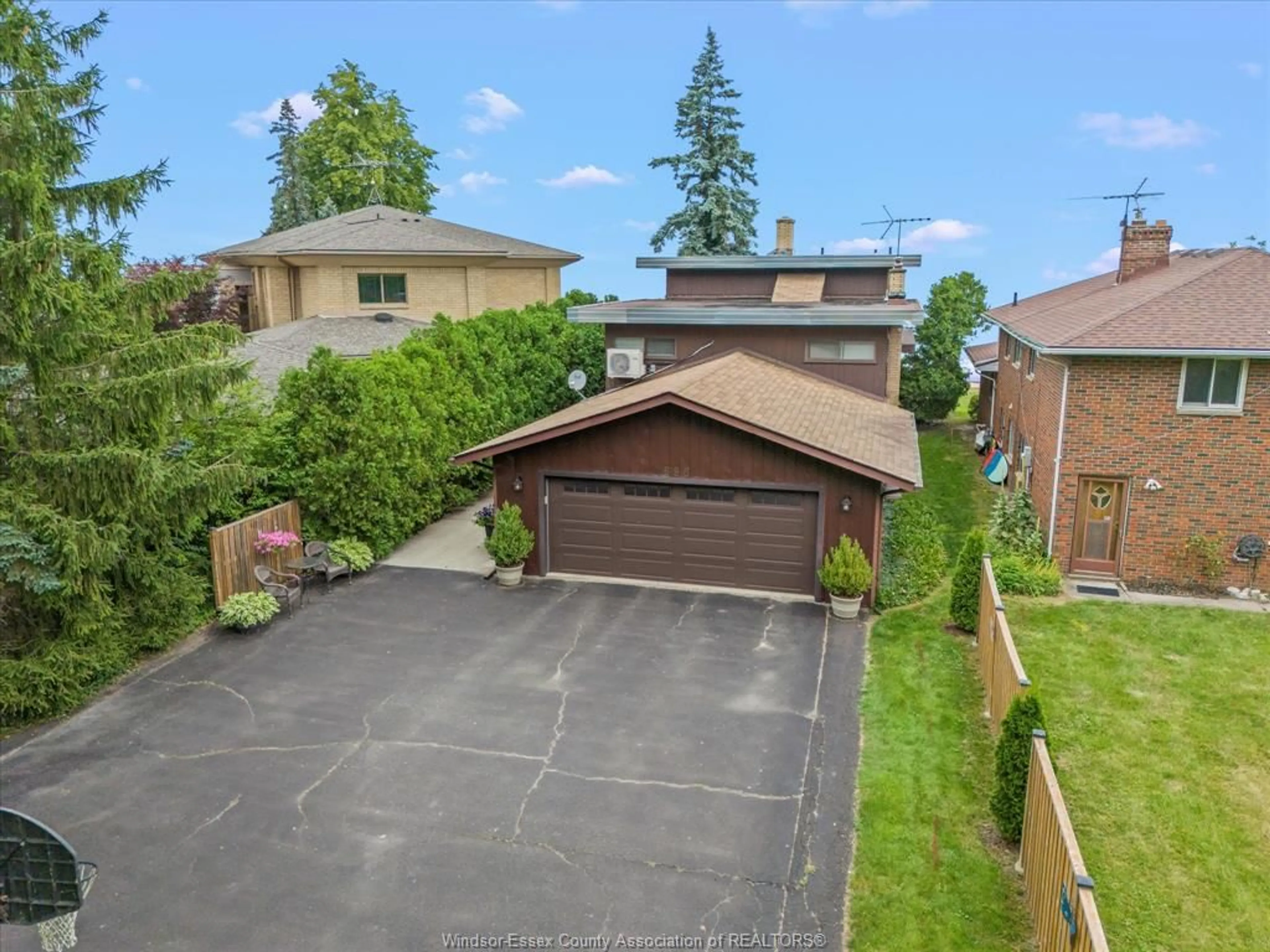 A pic from outside/outdoor area/front of a property/back of a property/a pic from drone, street for 696 Old Tecumseh Rd, Lakeshore Ontario N0R 1A0
