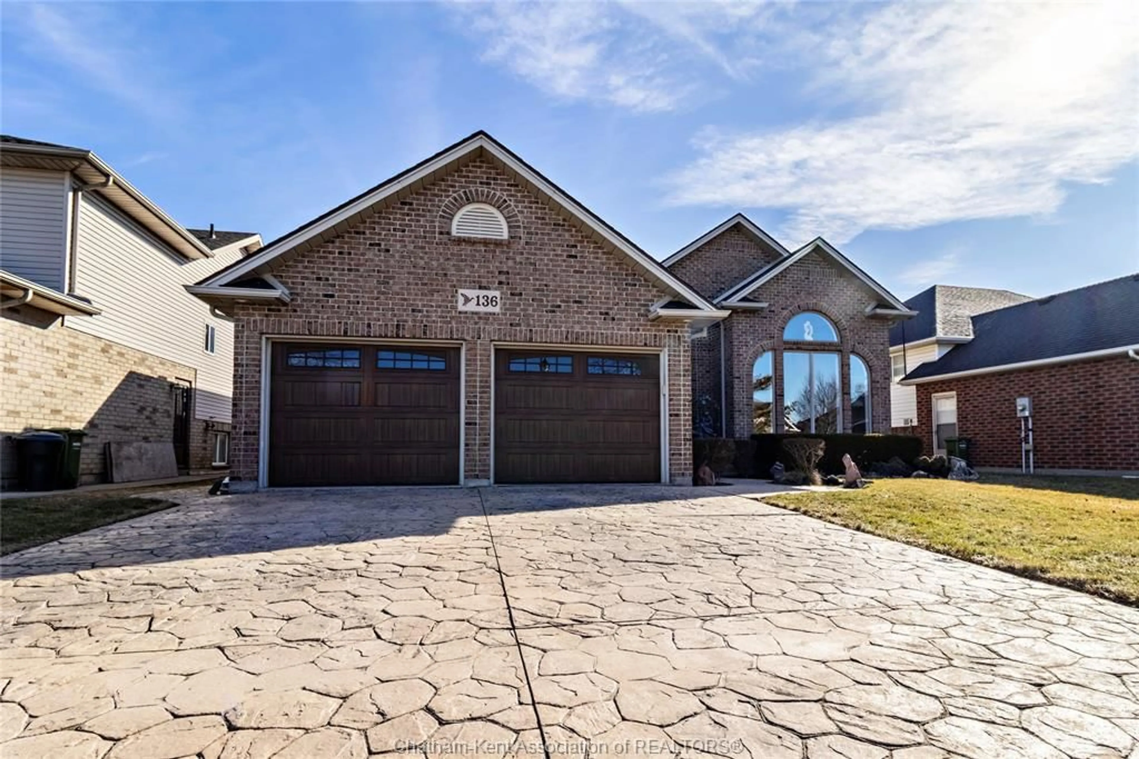 Home with brick exterior material, street for 136 Mousseau Cres, Belle River Ontario N8L 0M6