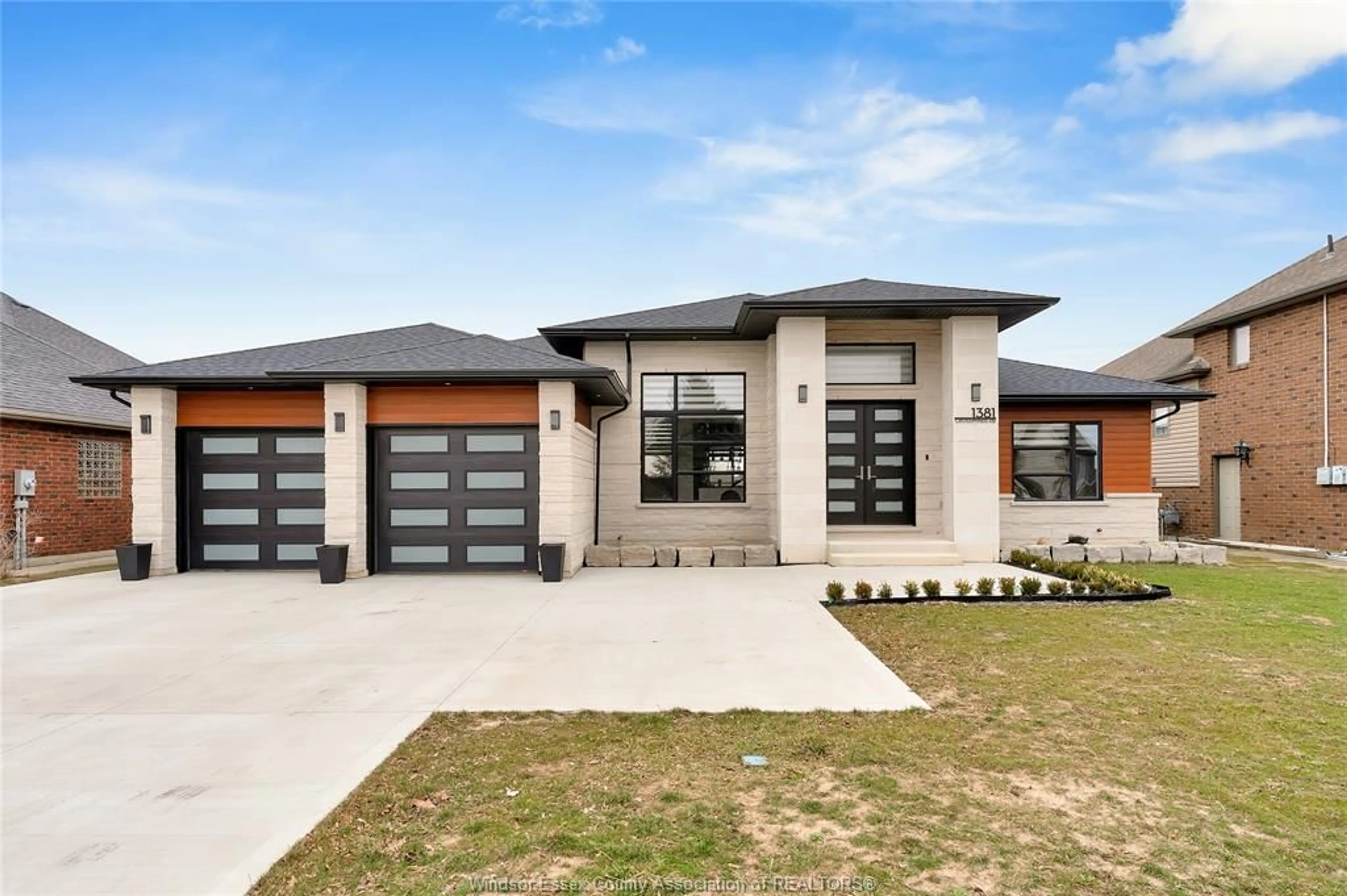 Home with brick exterior material, street for 1381 CROSSWINDS, Lakeshore Ontario N0R 1A0