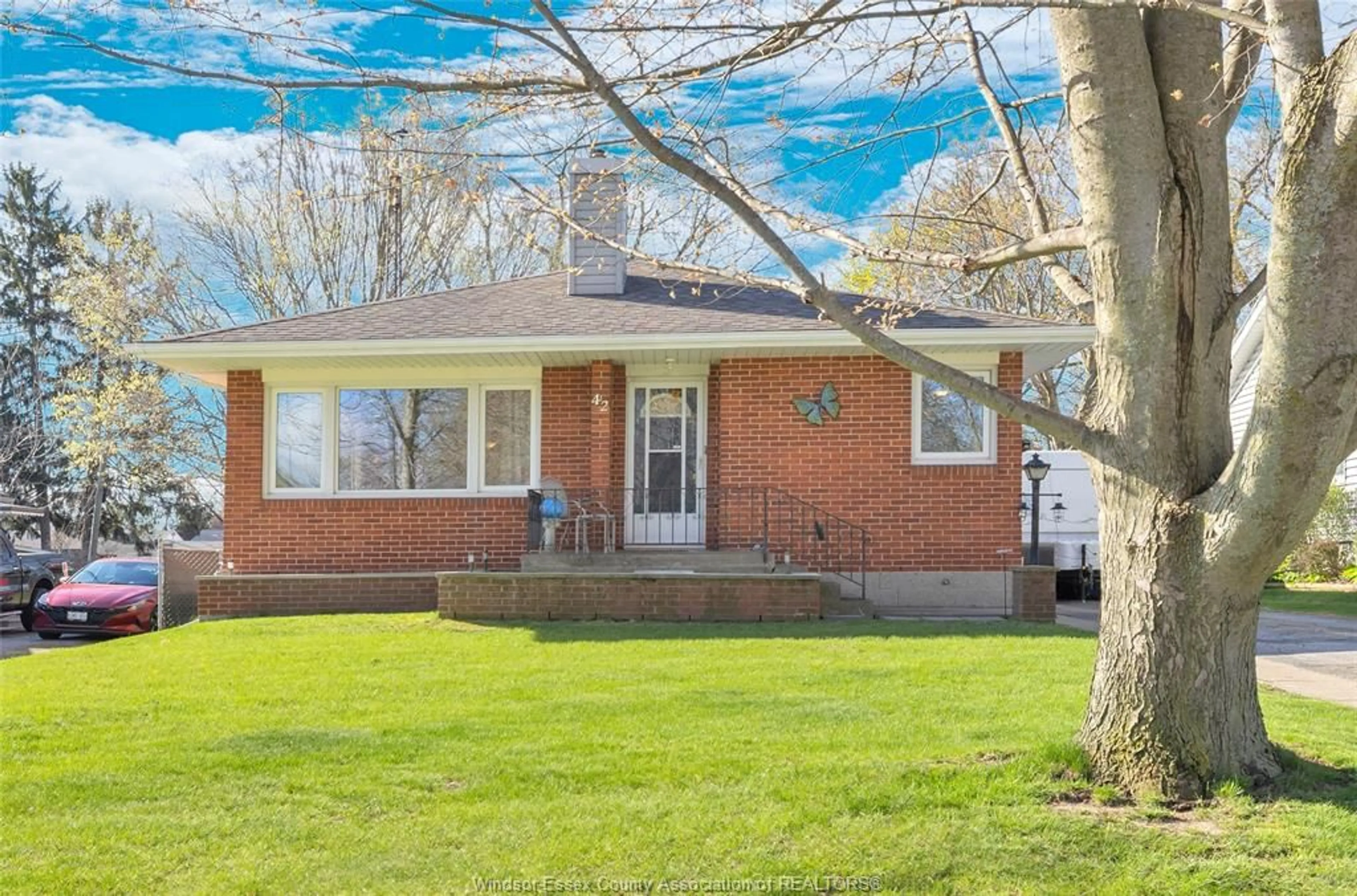 Home with brick exterior material, street for 42 GRACE, Leamington Ontario N8H 1K9