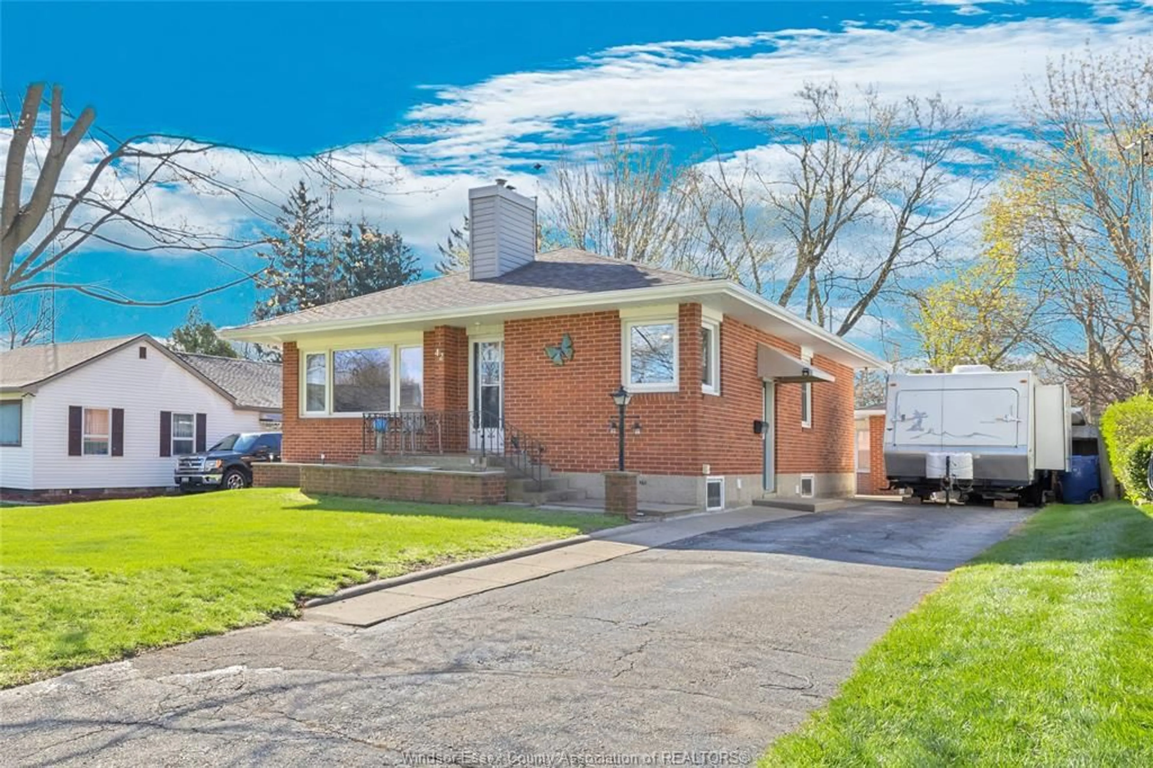 Home with brick exterior material, street for 42 GRACE, Leamington Ontario N8H 1K9