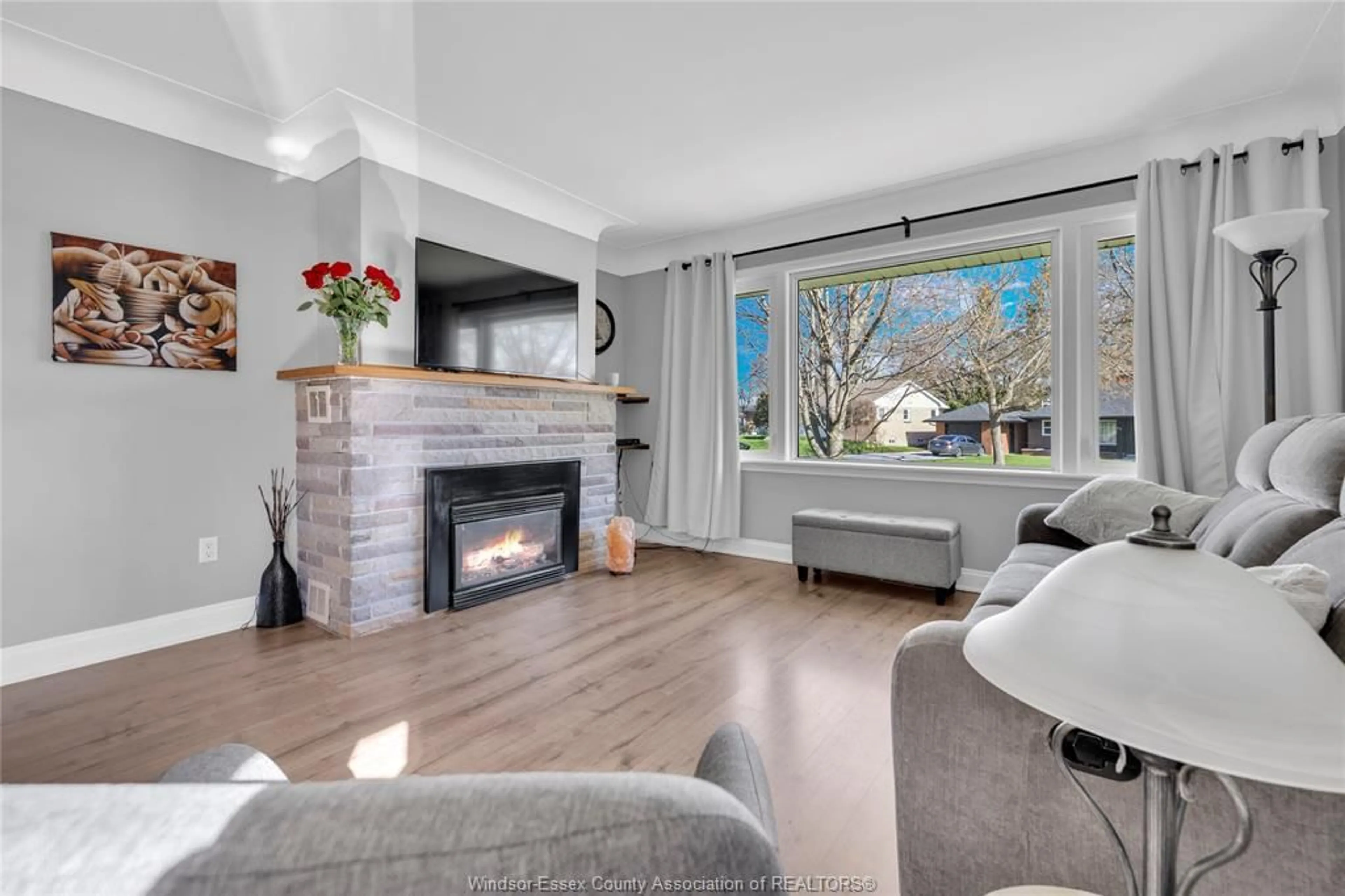 Living room with furniture, wood/laminate floor for 42 GRACE, Leamington Ontario N8H 1K9