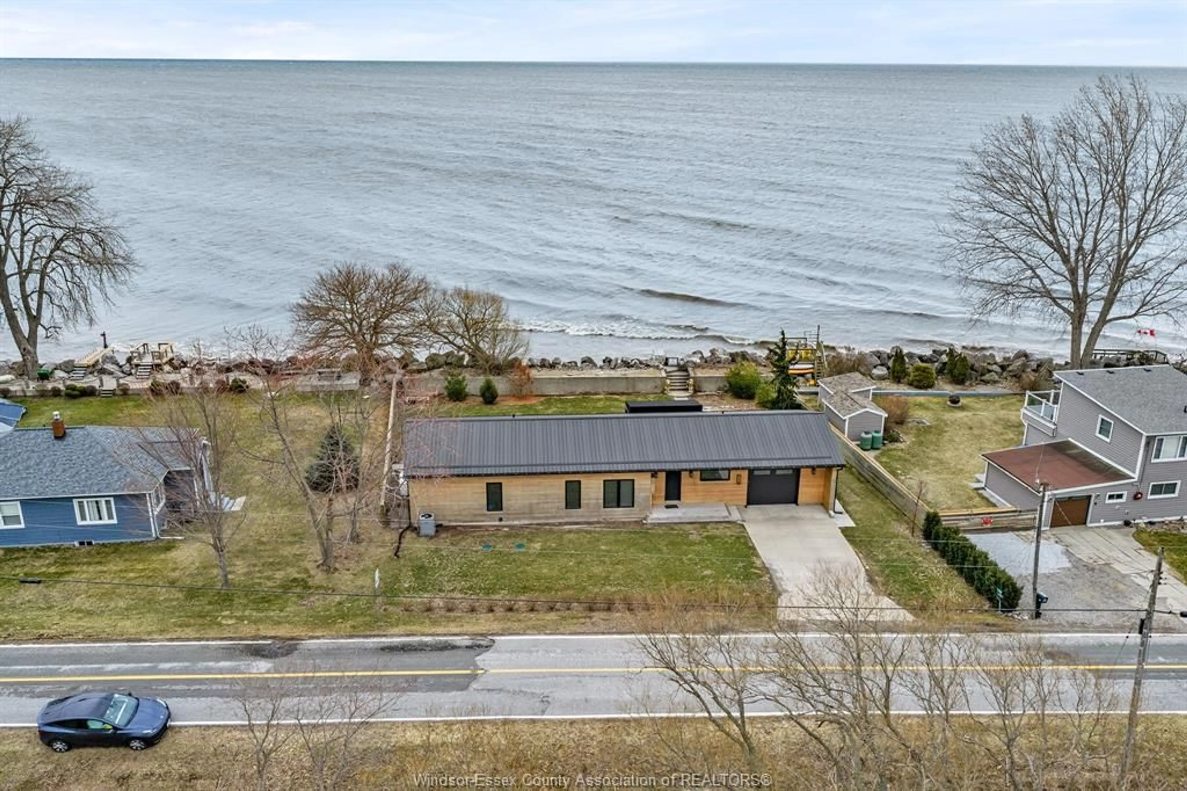 A pic from outside/outdoor area/front of a property/back of a property/a pic from drone, water/lake/river/ocean view for 116 EAST BEACH, Leamington Ontario N8H 3V7