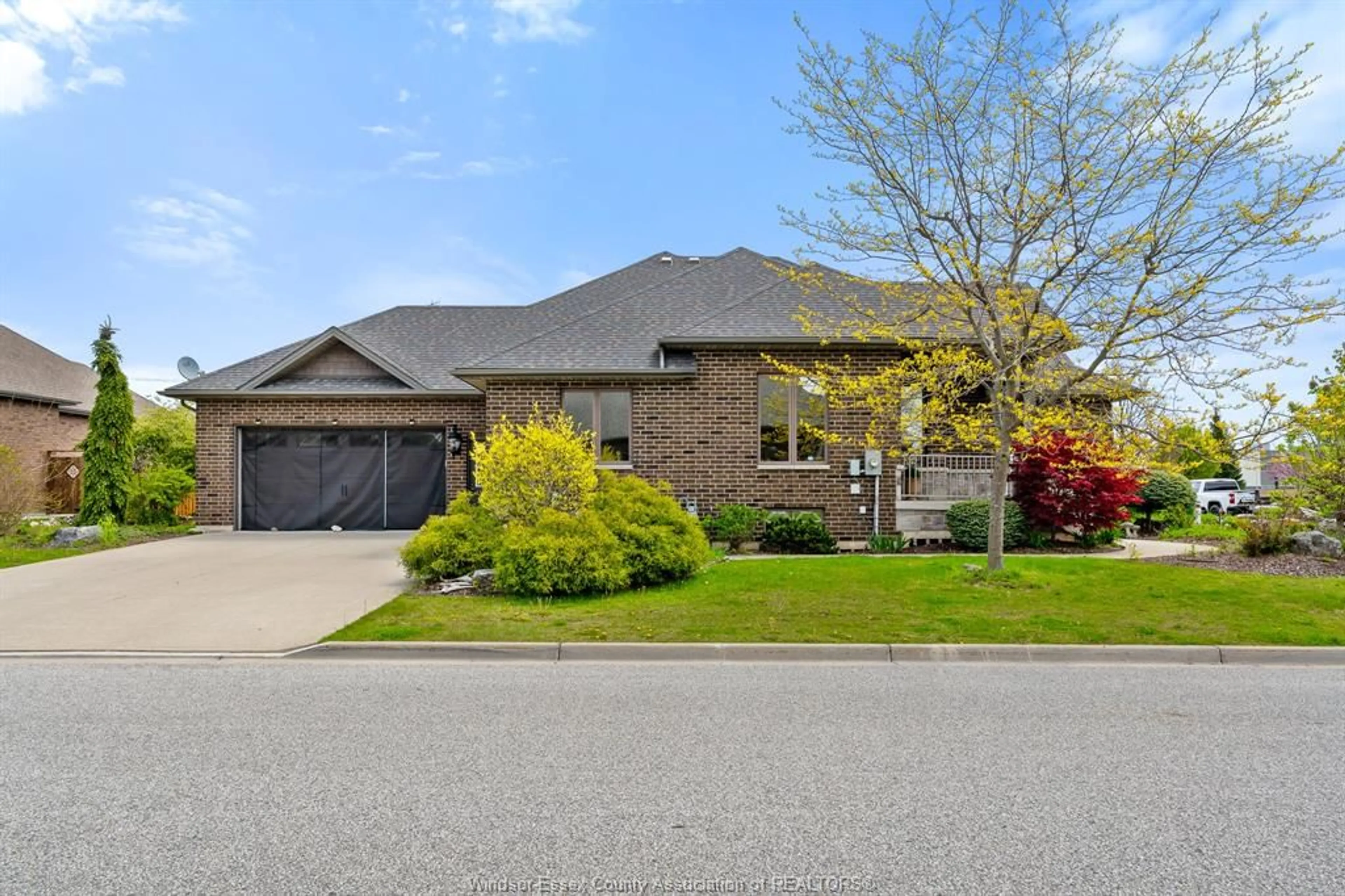 Home with brick exterior material, street for 222 Woodycrest Ave, Kingsville Ontario N9Y 0B8