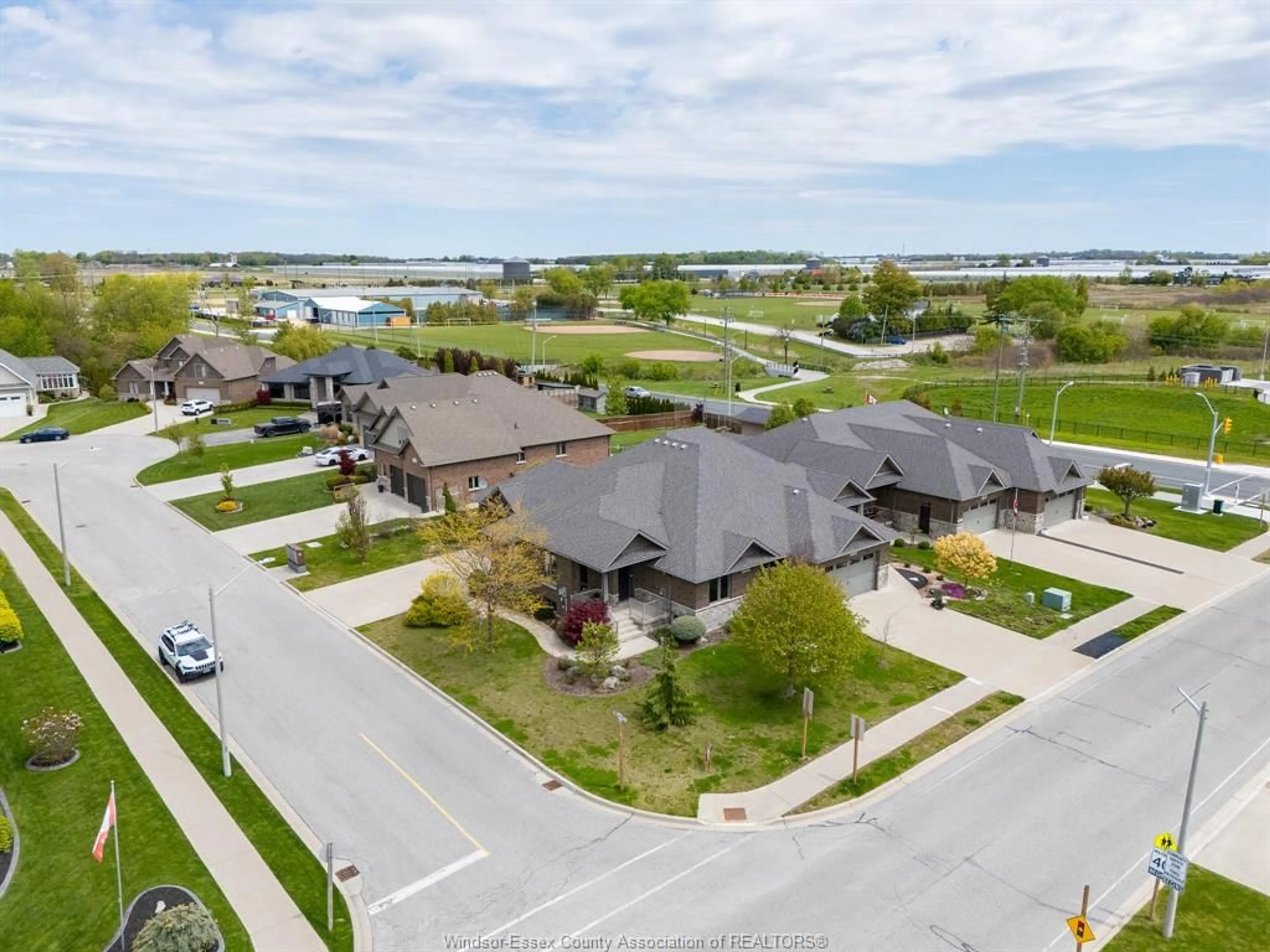 A pic from outside/outdoor area/front of a property/back of a property/a pic from drone, water/lake/river/ocean view for 222 Woodycrest Ave, Kingsville Ontario N9Y 0B8