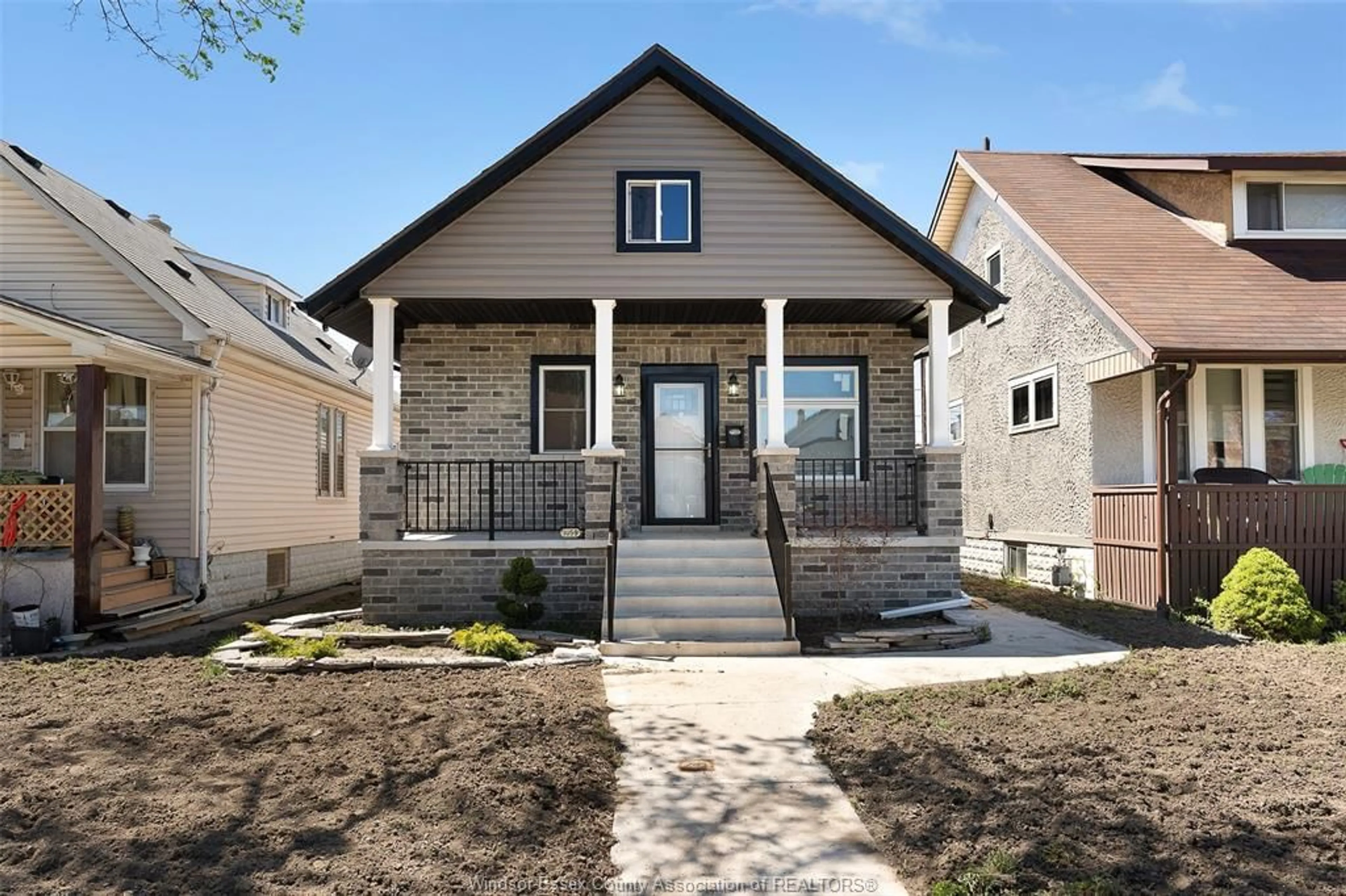 Home with brick exterior material, street for 1059 ELSMERE Ave, Windsor Ontario N9A 2B1