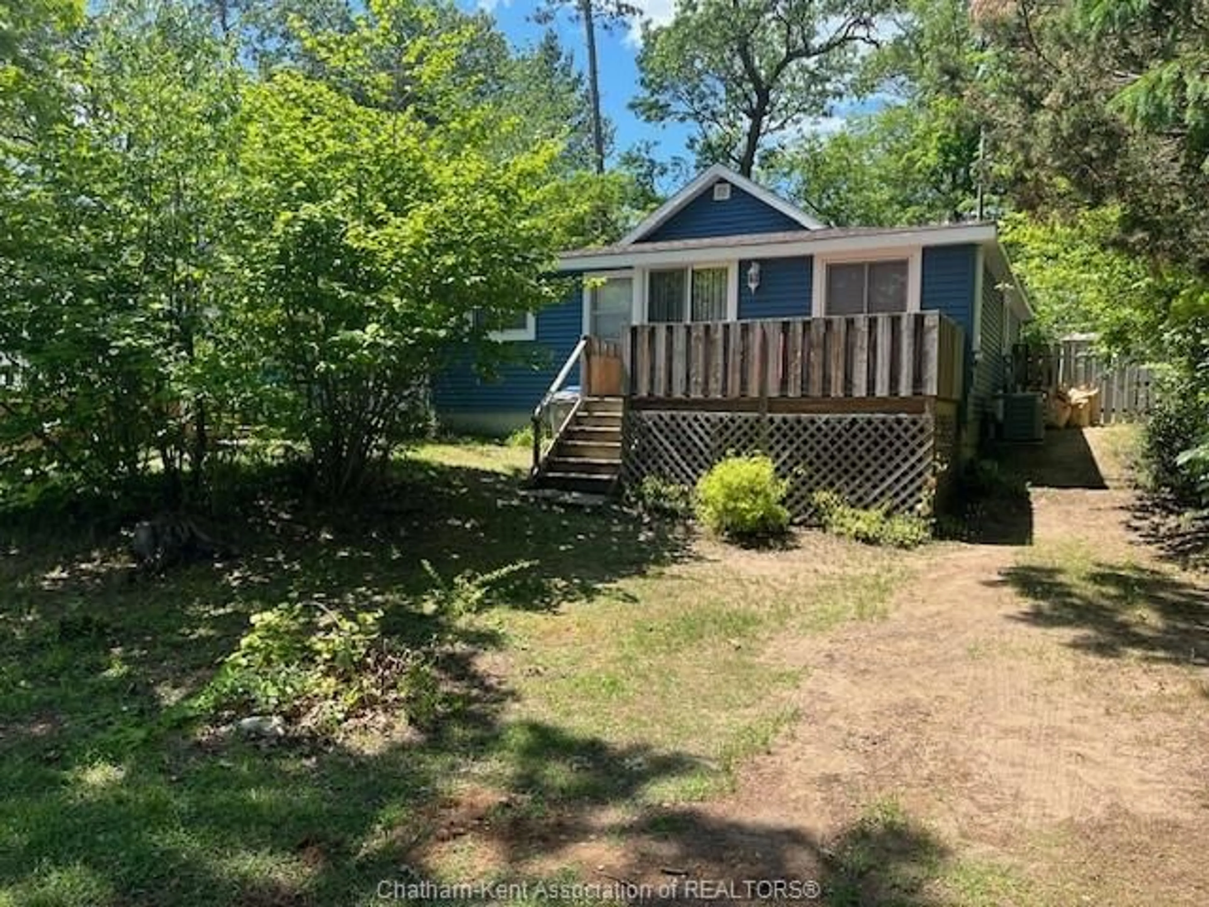 A pic from outside/outdoor area/front of a property/back of a property/a pic from drone, water/lake/river/ocean view for 29 ELMWOOD Ave, Grand Bend Ontario N0M 1T0