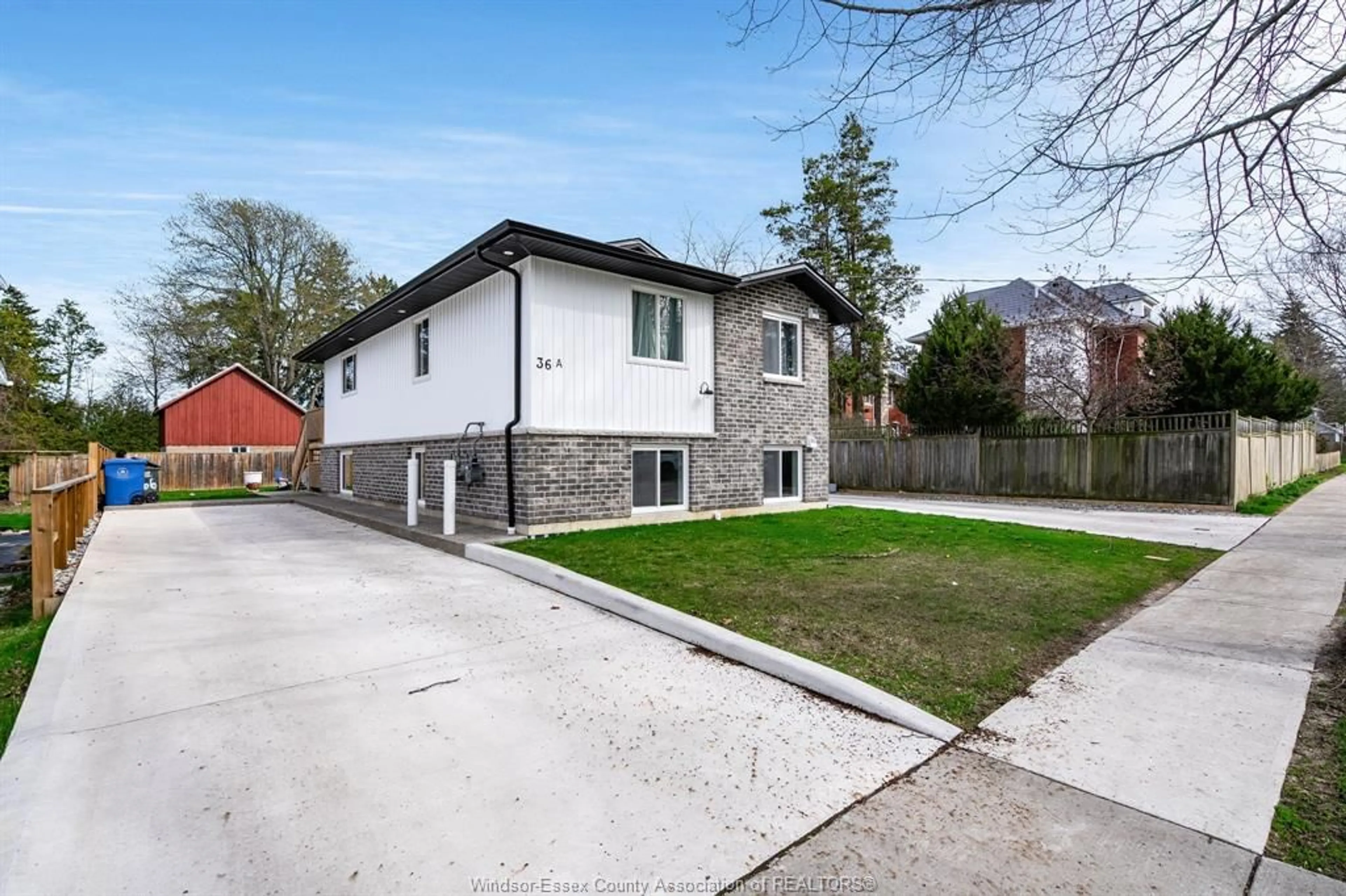 A pic from outside/outdoor area/front of a property/back of a property/a pic from drone, street for 36 Victoria Ave, Leamington Ontario N8H 2W6