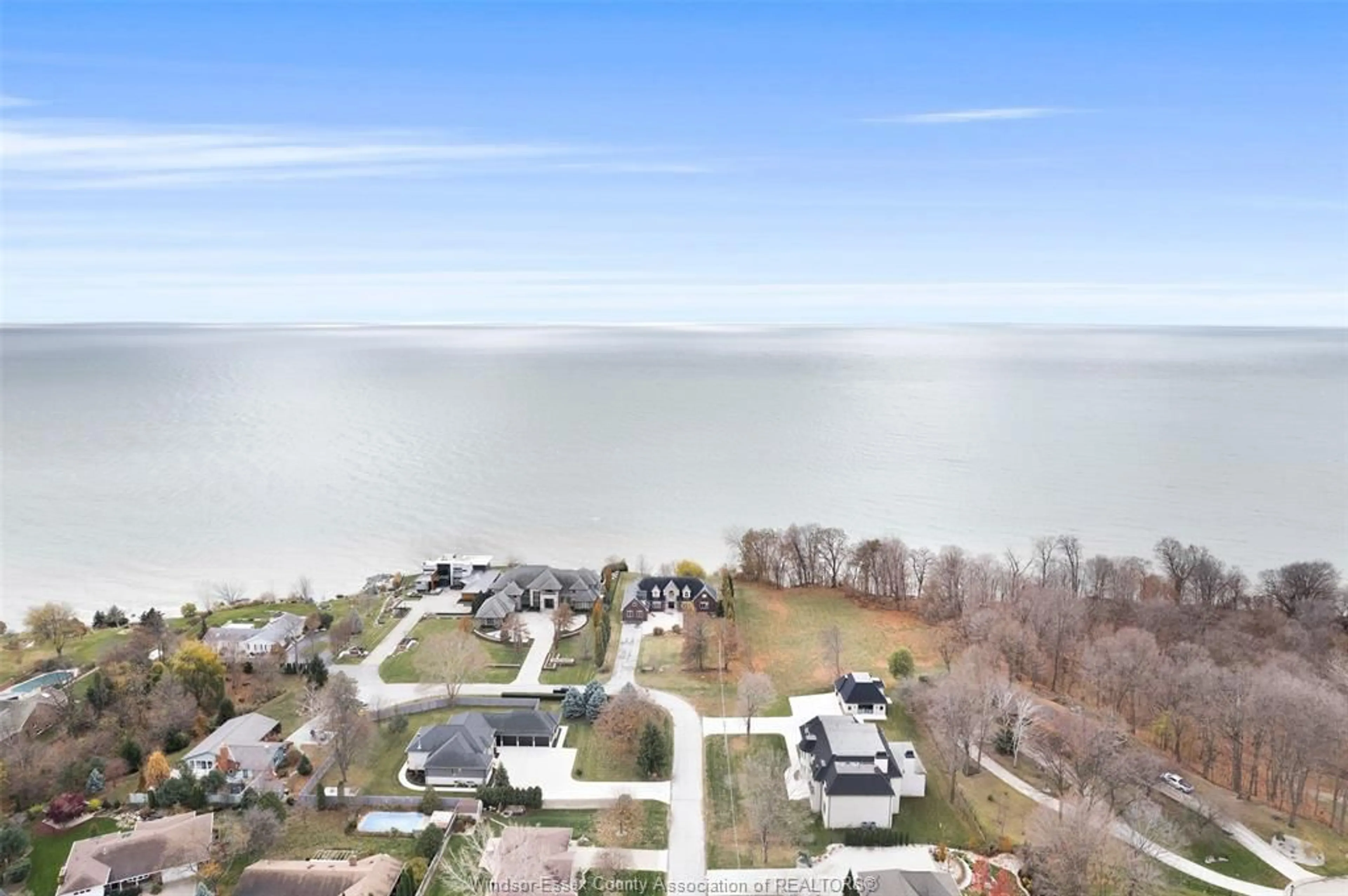 A pic from outside/outdoor area/front of a property/back of a property/a pic from drone, water/lake/river/ocean view for 2055 HICKORY Lane, Kingsville Ontario N9Y 2X9