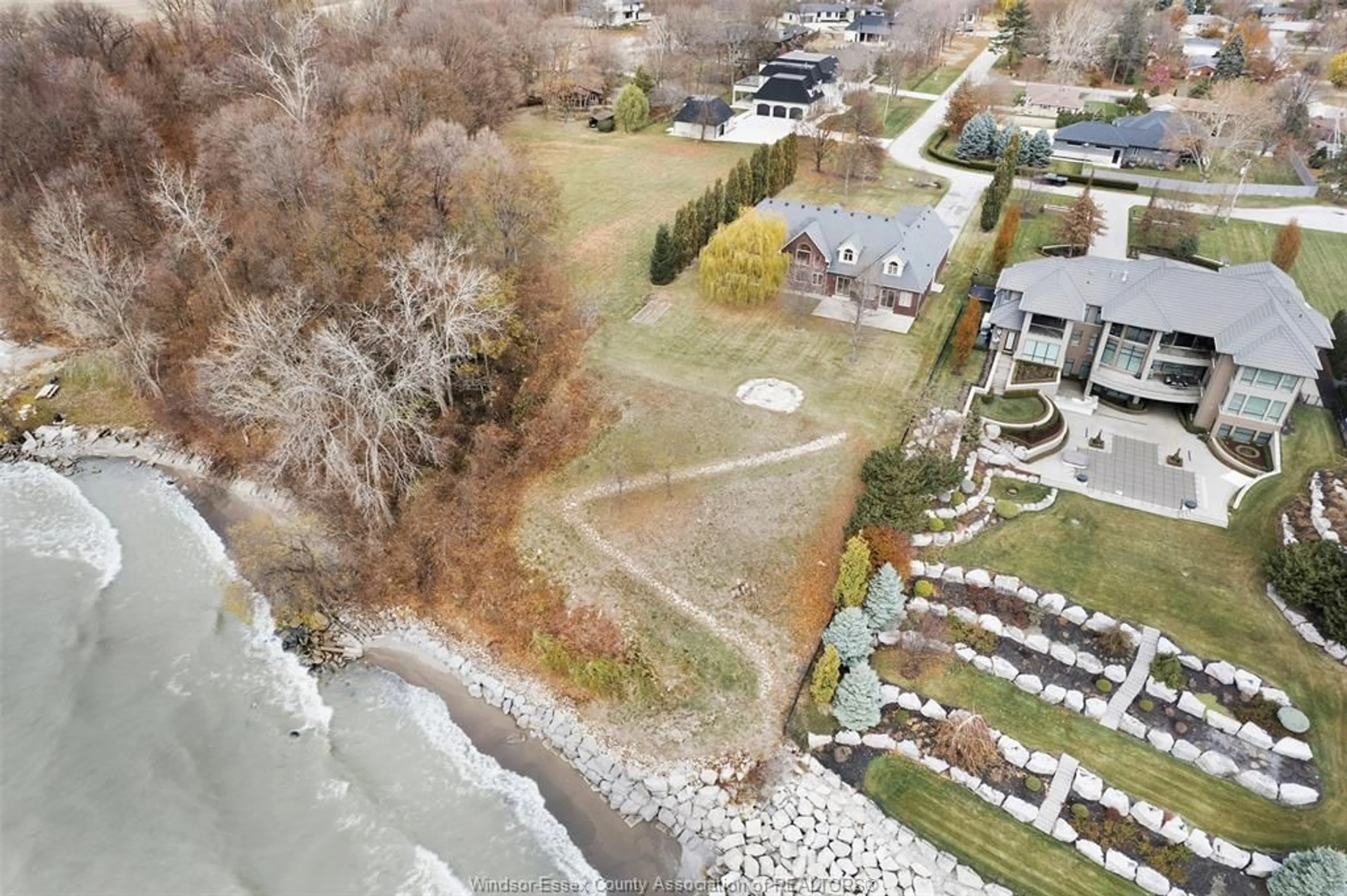 A pic from outside/outdoor area/front of a property/back of a property/a pic from drone, water/lake/river/ocean view for 2055 HICKORY Lane, Kingsville Ontario N9Y 2X9