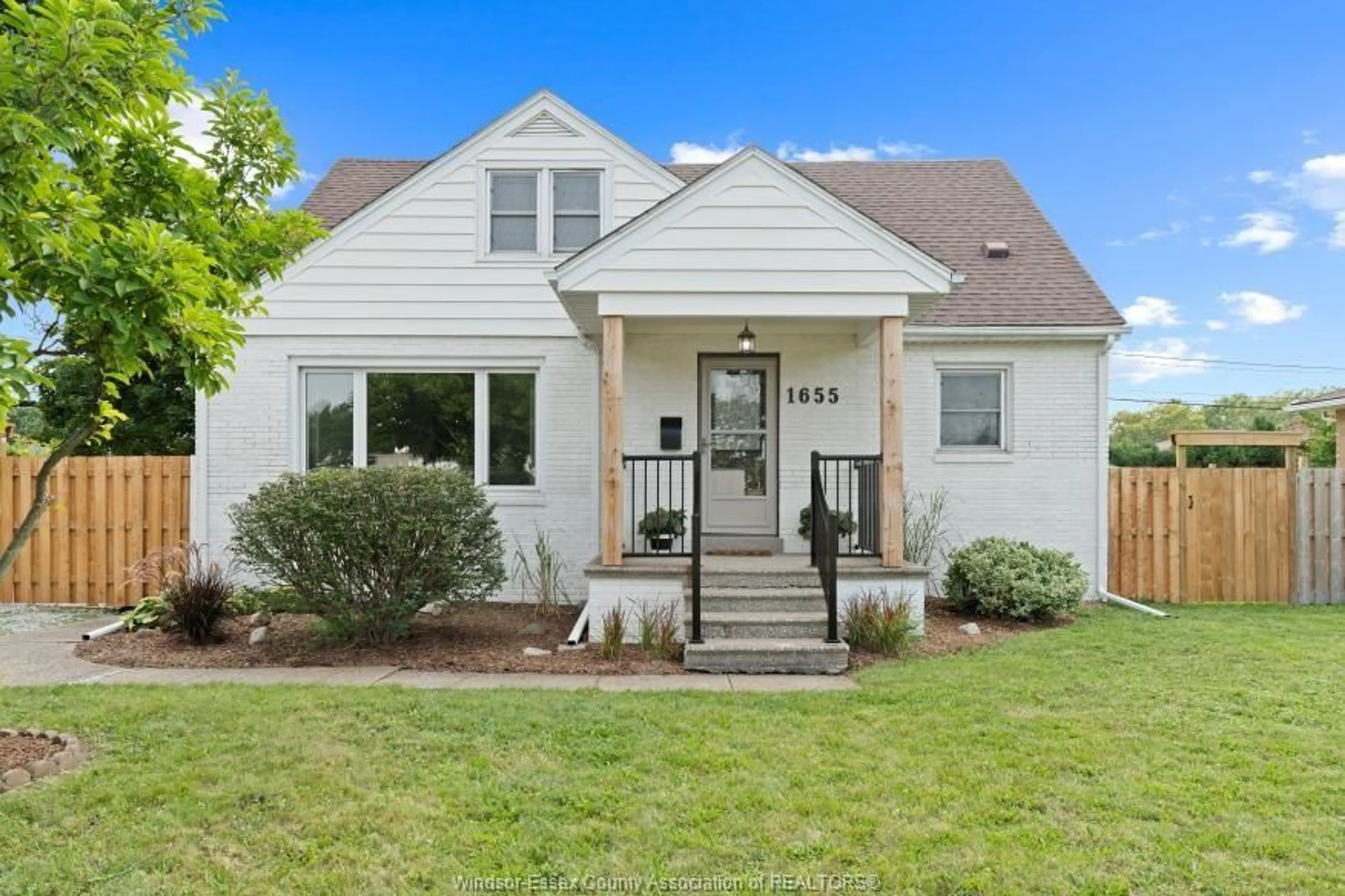 Home with vinyl exterior material, street for 1655 PARTINGTON Ave, Windsor Ontario N9E 2P9