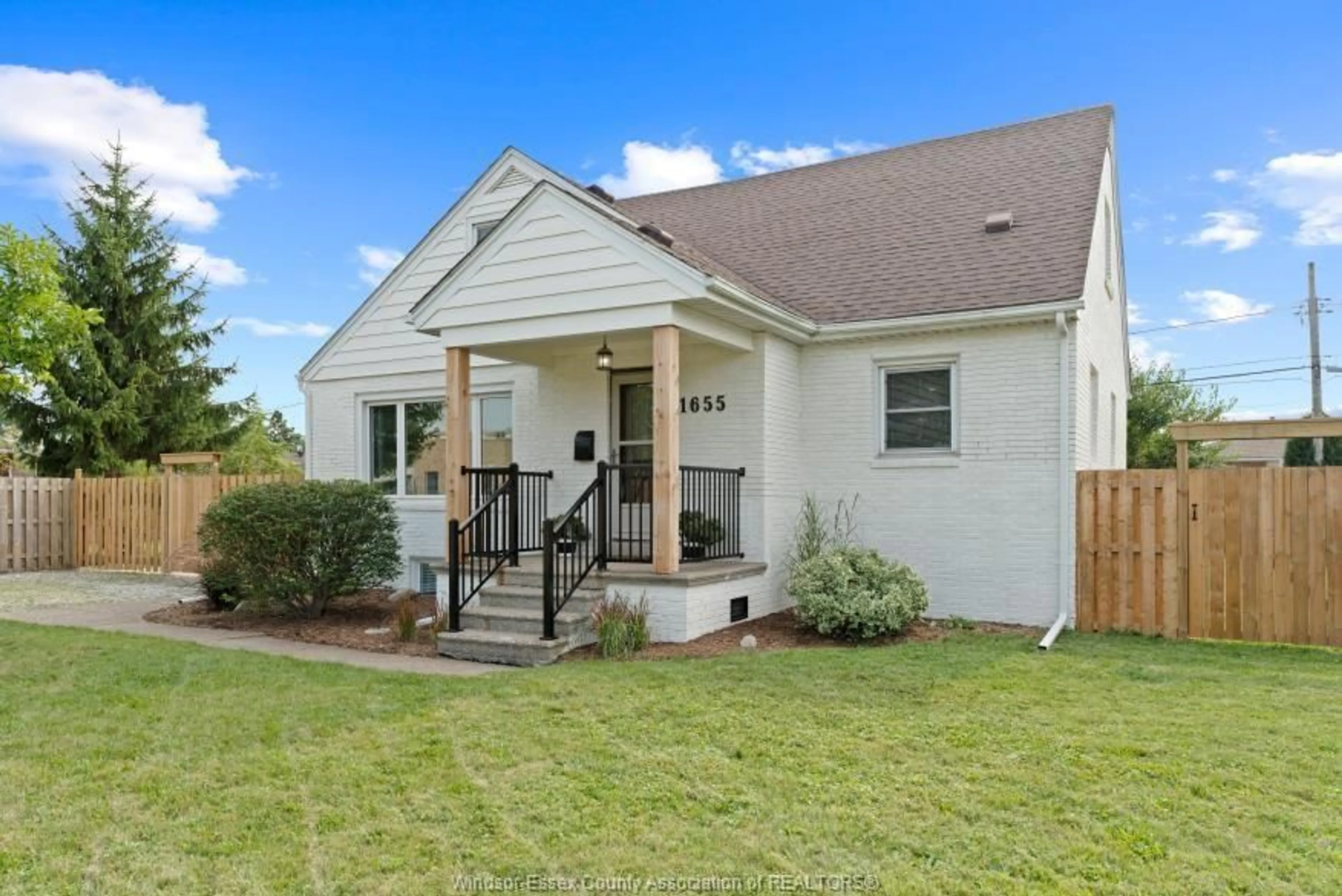 Home with vinyl exterior material, street for 1655 PARTINGTON Ave, Windsor Ontario N9E 2P9