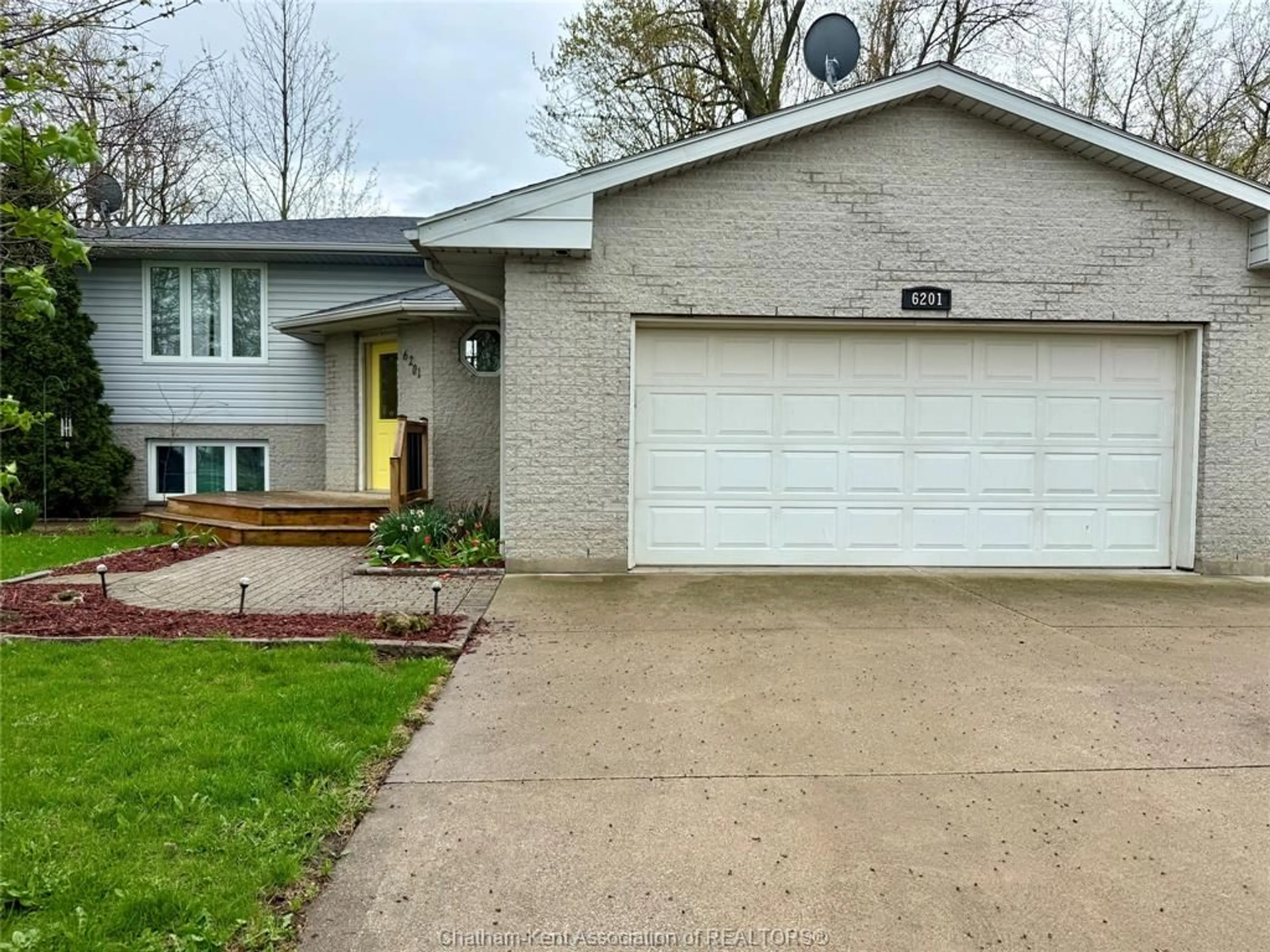 Home with brick exterior material, street for 6201 Main St, Comber Ontario N0P 1J0