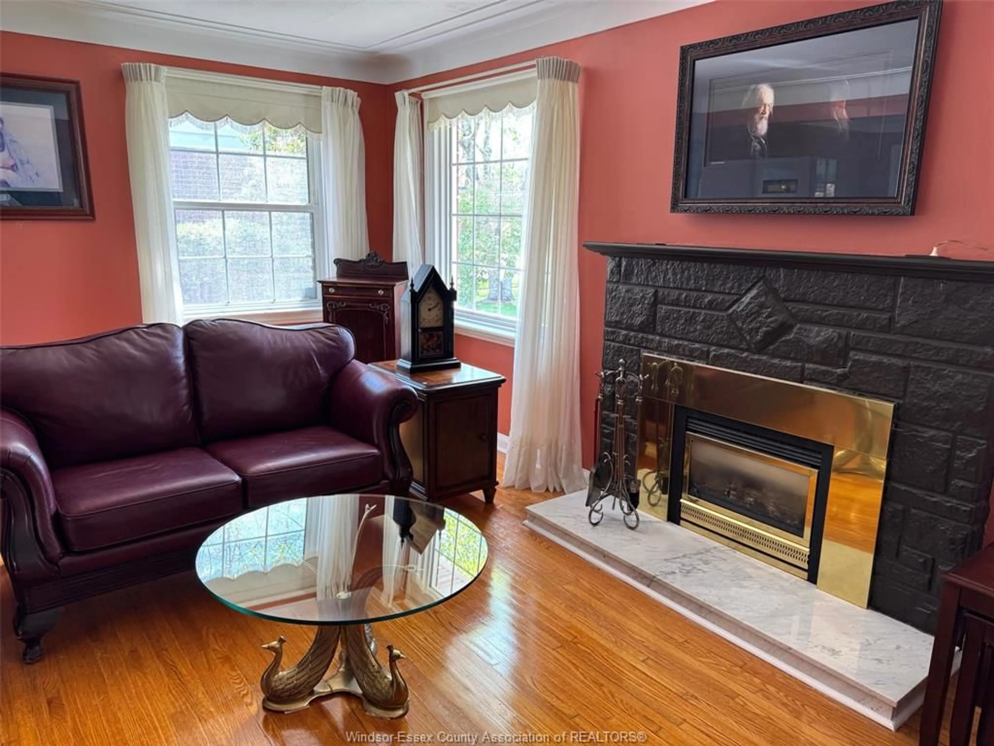 Living room with furniture, wood/laminate floor for 2440 BUCKINGHAM Dr, Windsor Ontario N8T 2B5