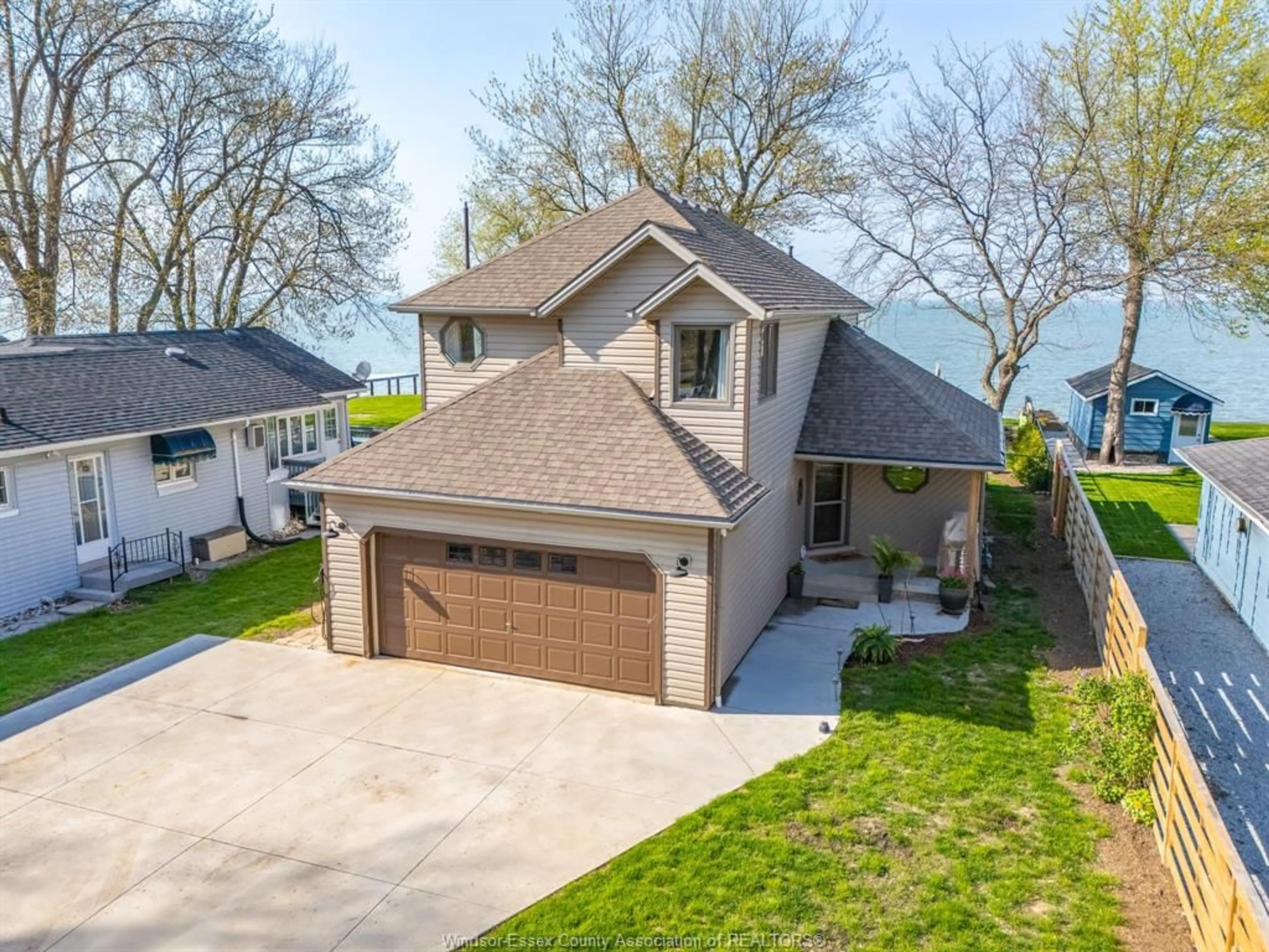 A pic from outside/outdoor area/front of a property/back of a property/a pic from drone, water/lake/river/ocean view for 419 CHARRON BEACH, Lakeshore Ontario N8L 1J5