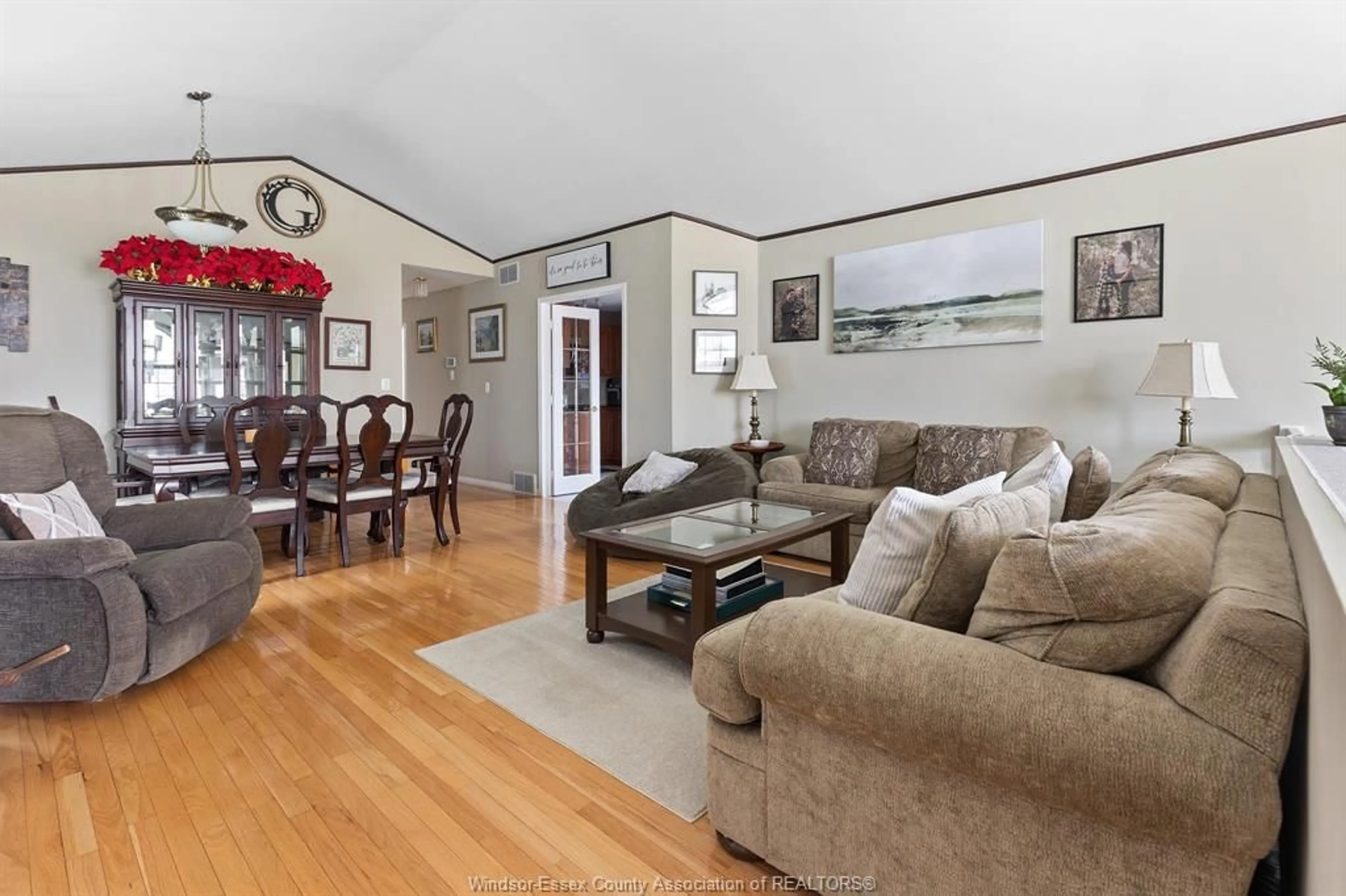 Living room with furniture, wood/laminate floor for 330 REAUME Rd, LaSalle Ontario N9J 1B1