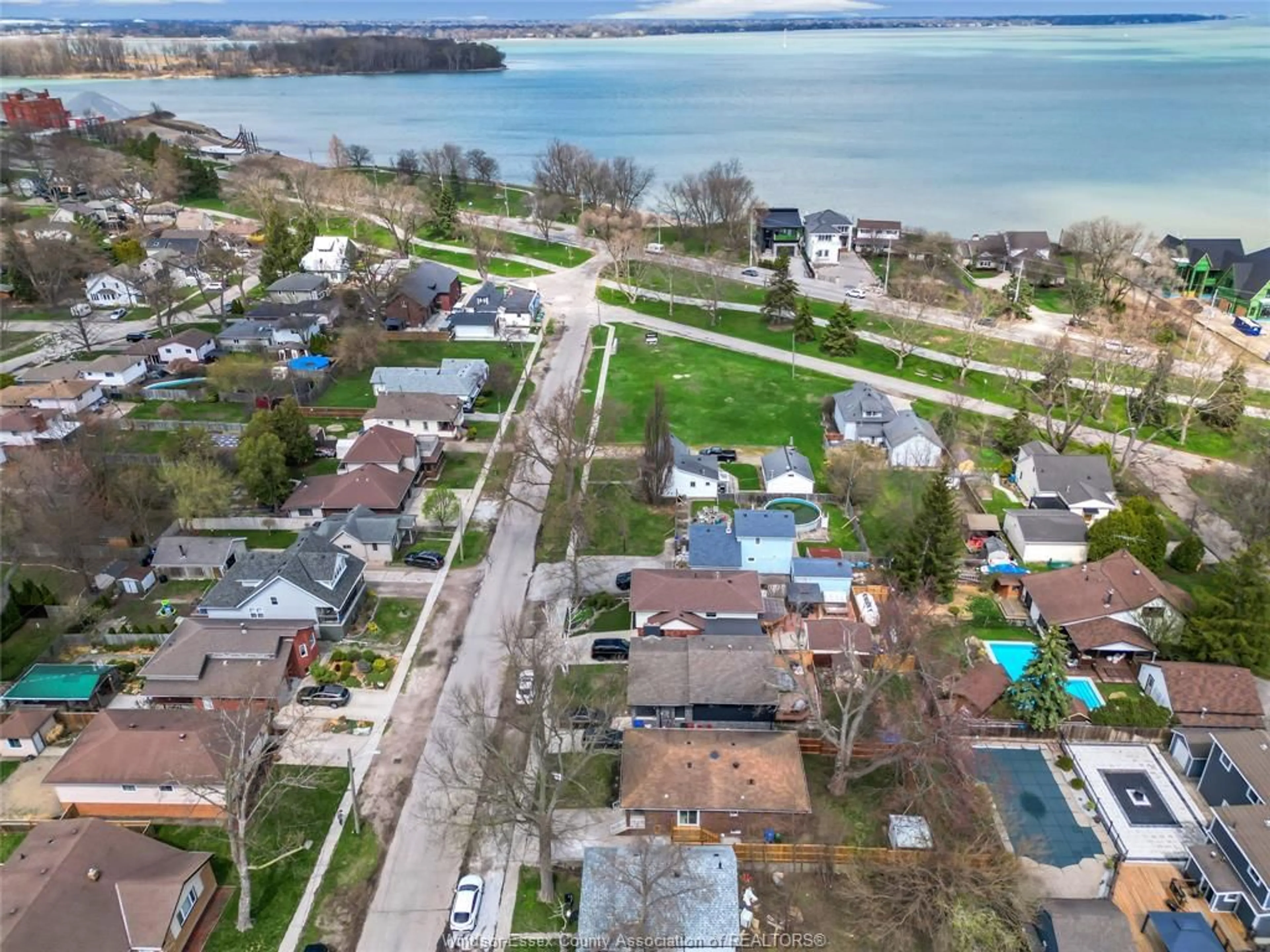 A pic from outside/outdoor area/front of a property/back of a property/a pic from drone, water/lake/river/ocean view for 556 CLOVER, Windsor Ontario N8P 1C6