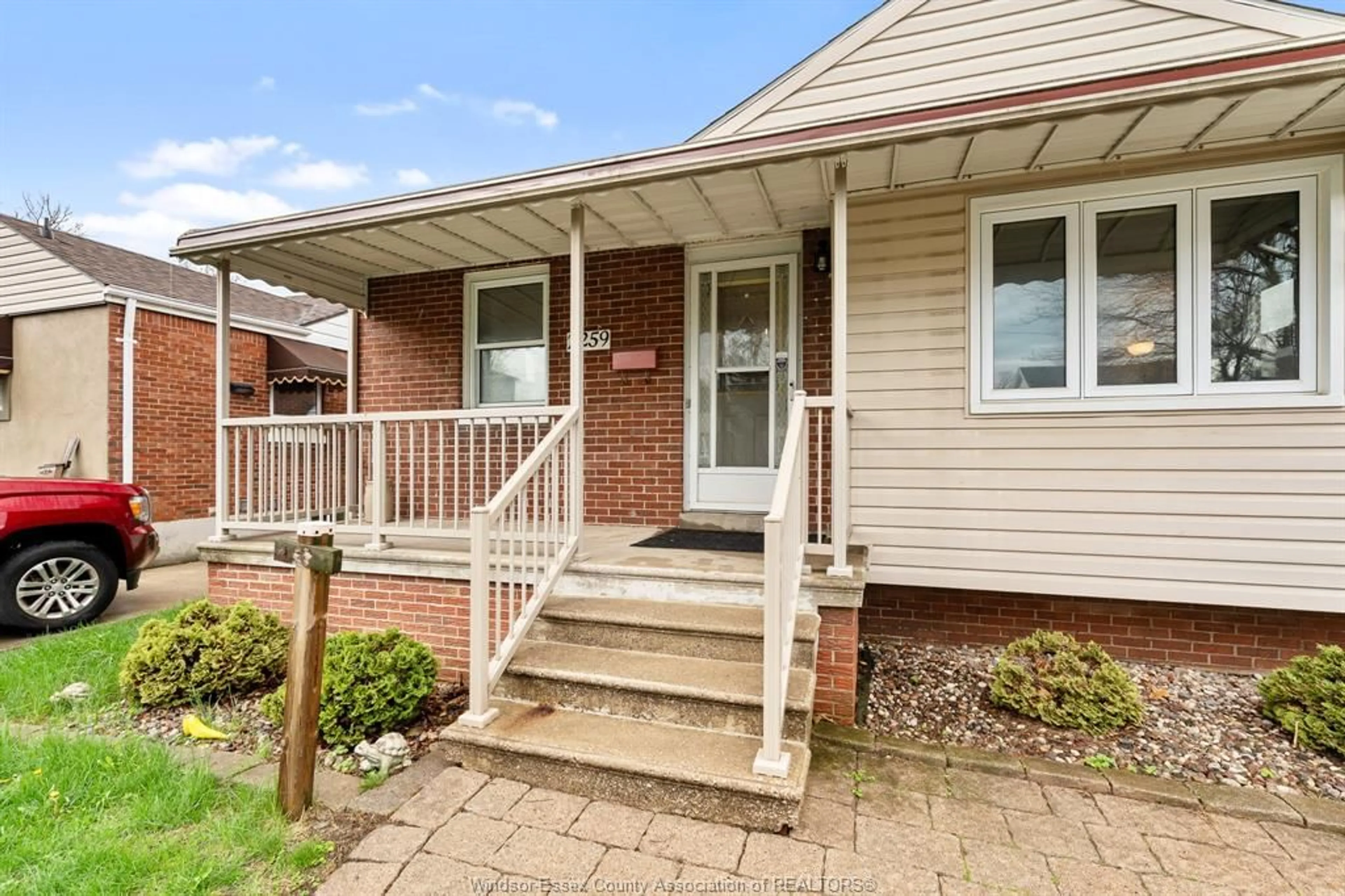 Home with brick exterior material, street for 2259 Parkwood Ave, Windsor Ontario N8W 2K1