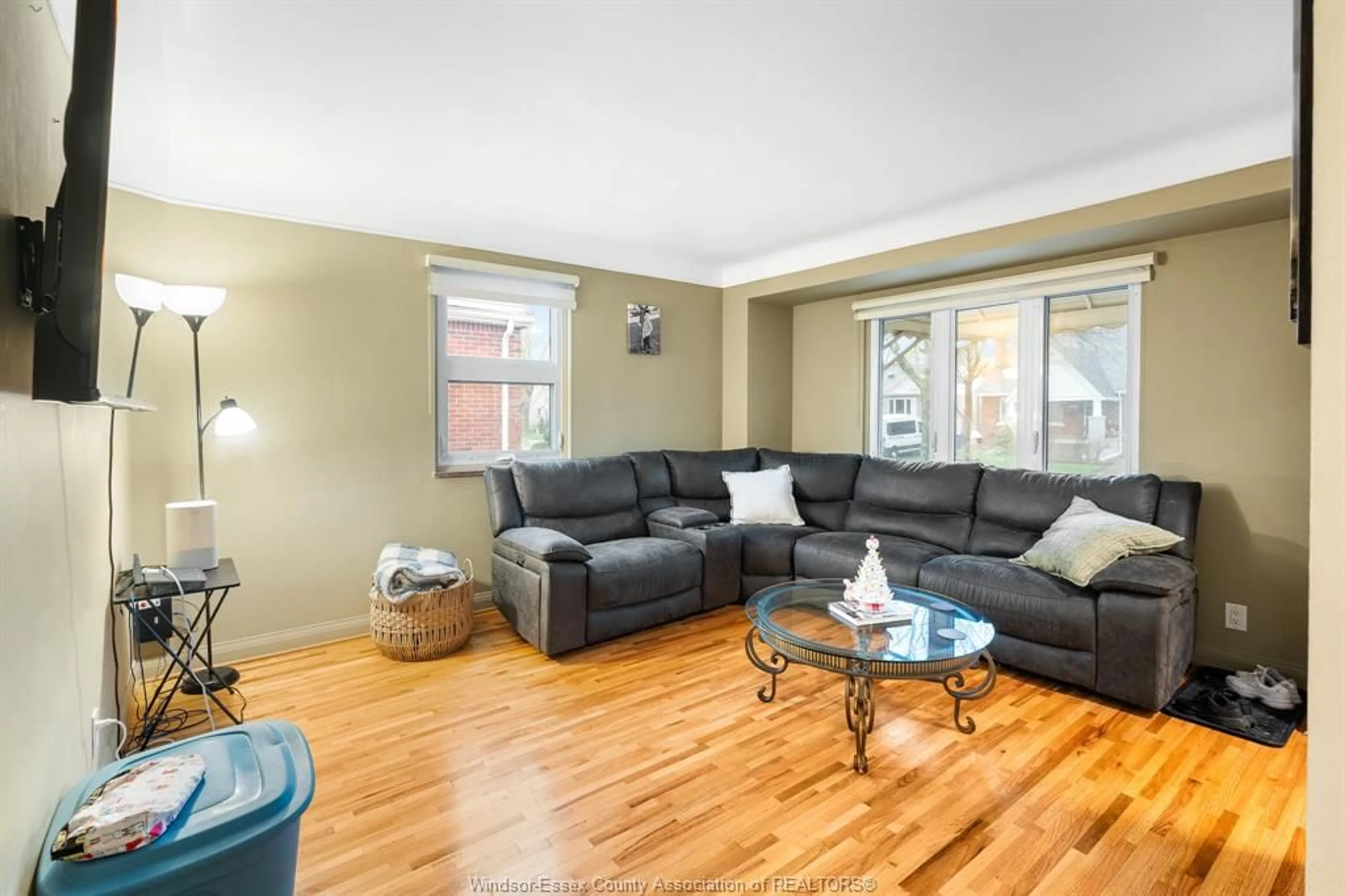 Living room with furniture, wood/laminate floor for 2259 Parkwood Ave, Windsor Ontario N8W 2K1