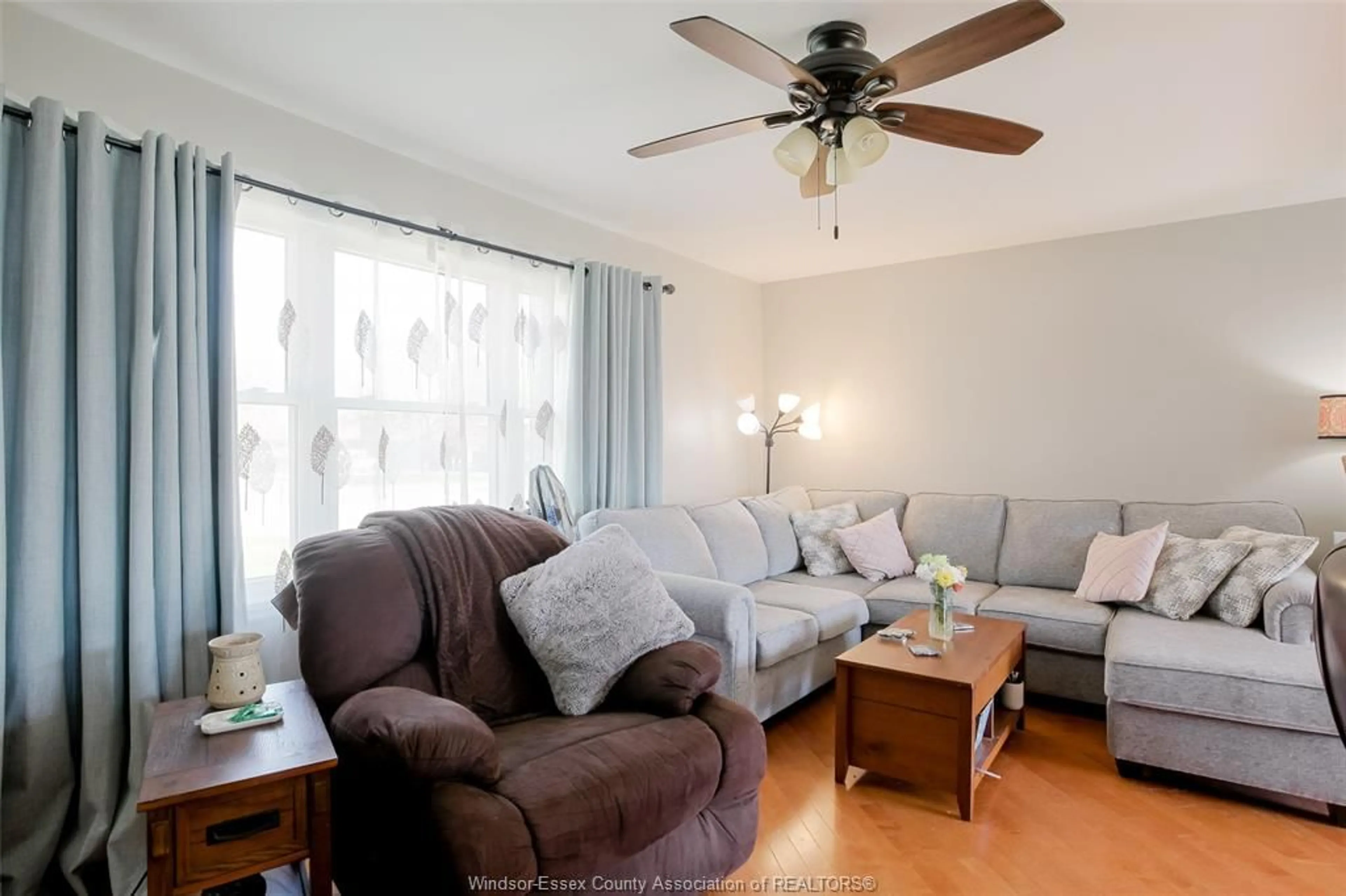 Living room with furniture, wood/laminate floor for 325 MCCURDY, Amherstburg Ontario N9V 3B8