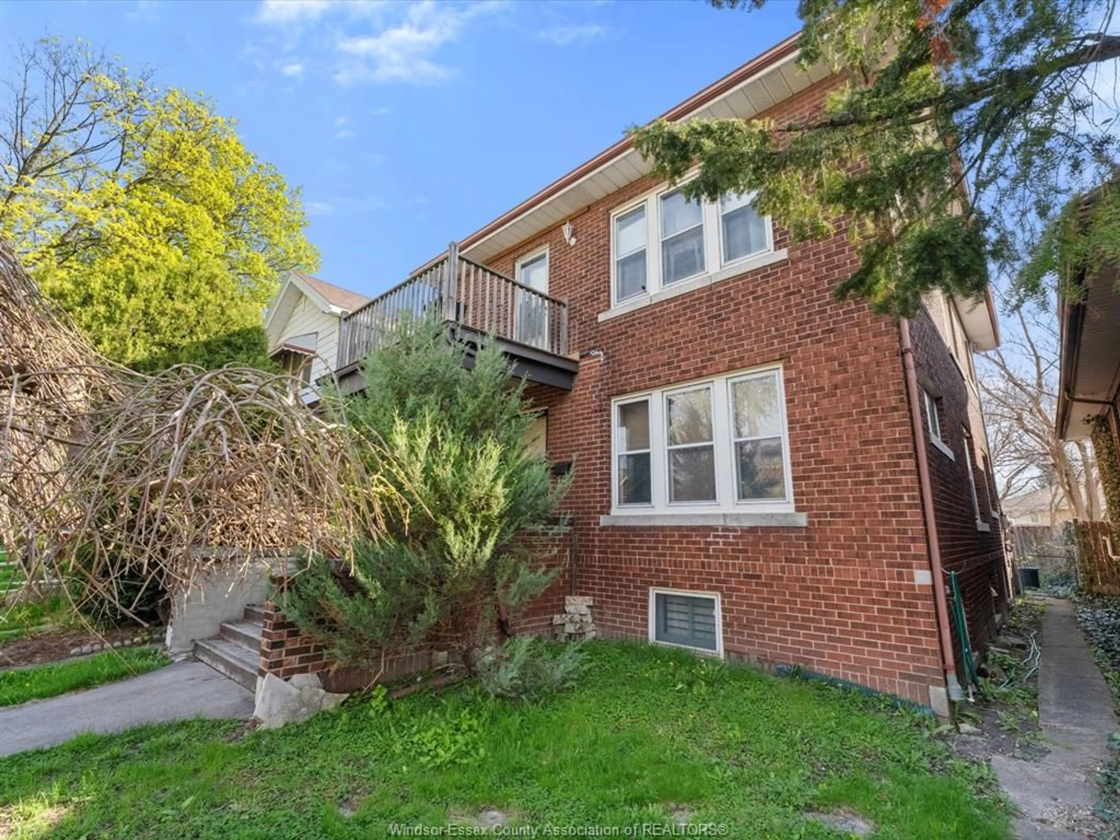 Home with brick exterior material, street for 1560-1562 DOUGALL Ave, Windsor Ontario N8X 1S1