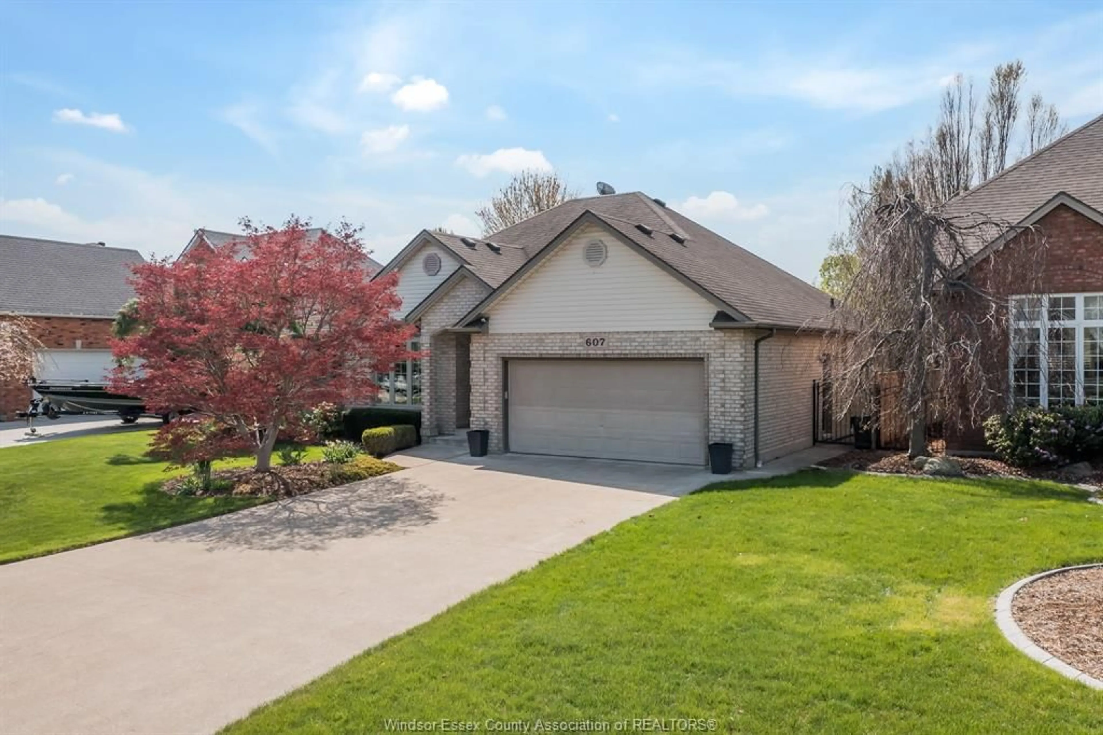 Home with brick exterior material, street for 607 GEORGE KENNEDY, Lakeshore Ontario N8L 0Z9