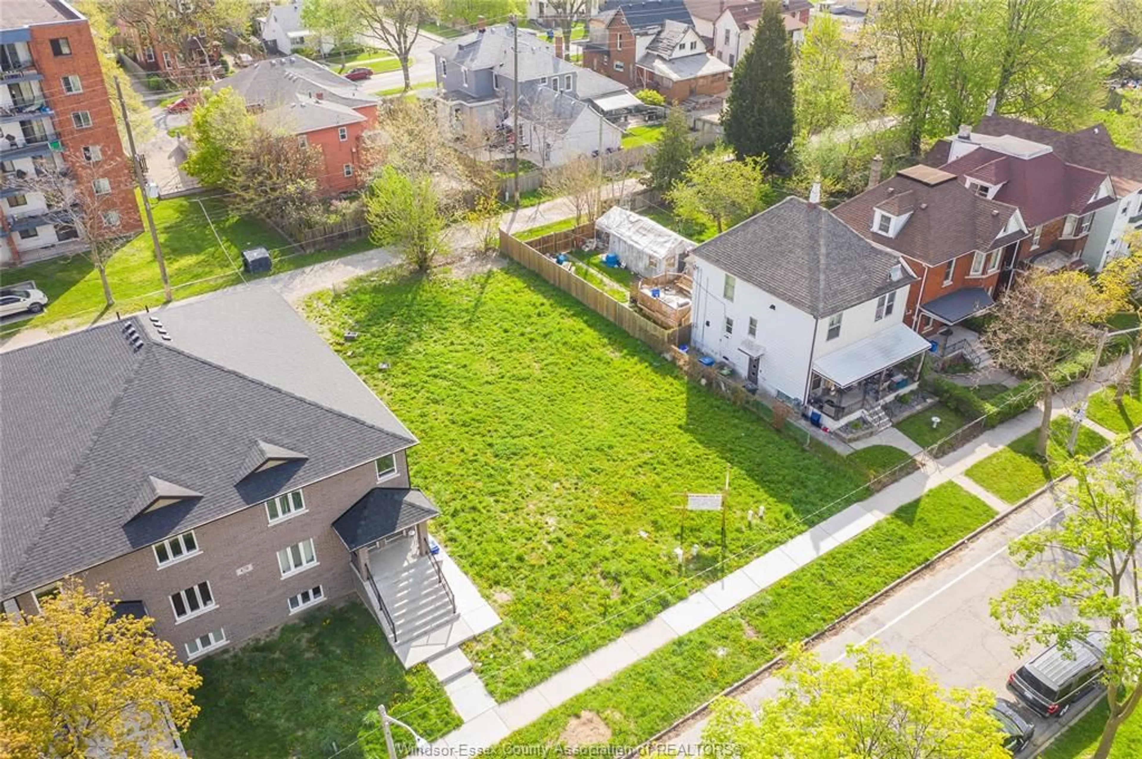 A pic from outside/outdoor area/front of a property/back of a property/a pic from drone, street for 484-488 JANETTE, Windsor Ontario N9A 4Z5