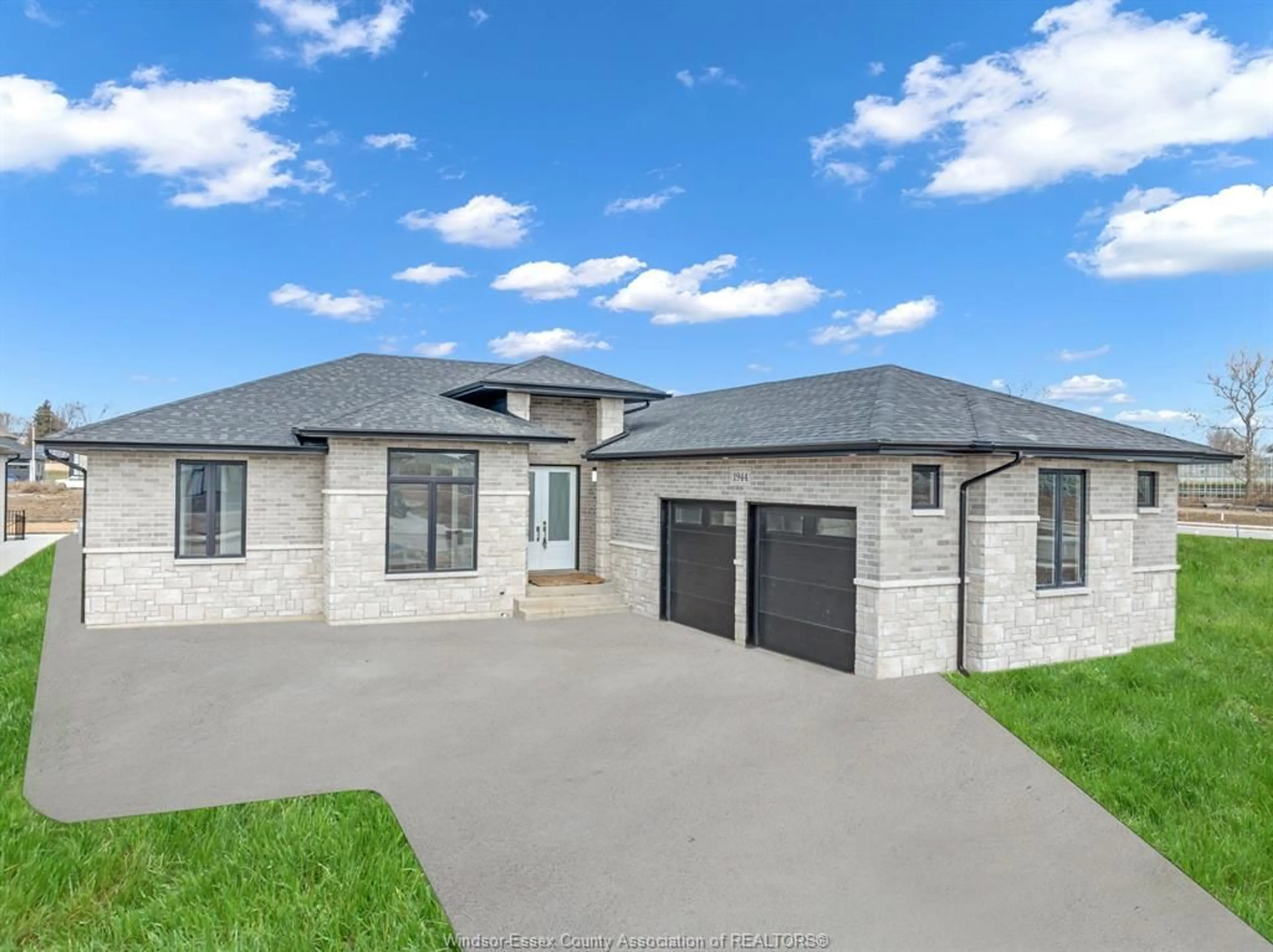 Home with brick exterior material, street for 1945 VILLA CANAL Dr, Kingsville Ontario N9Y 0G5