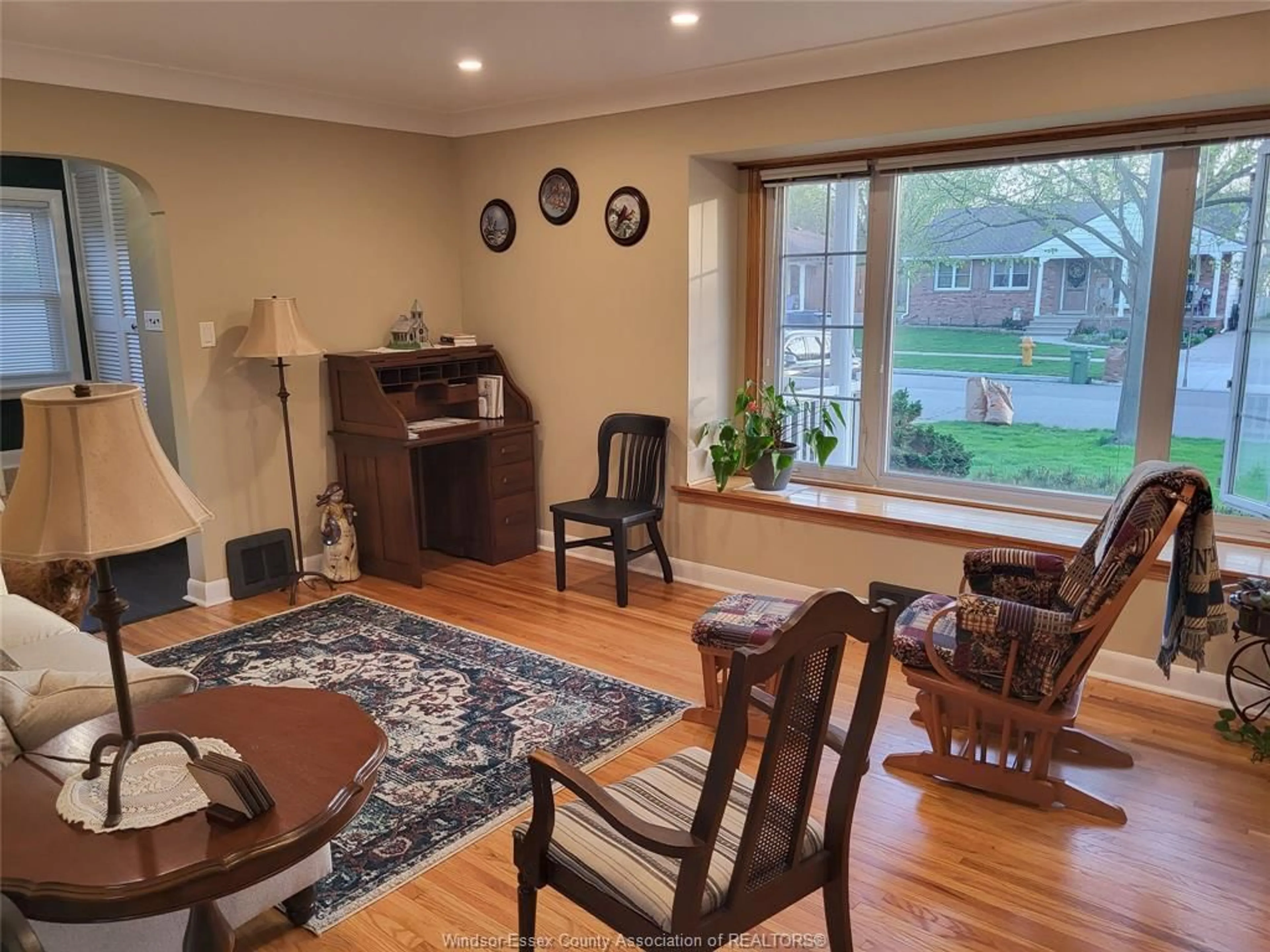 Living room with furniture, wood/laminate floor for 1038 JANISSE, Windsor Ontario N8S 2W1