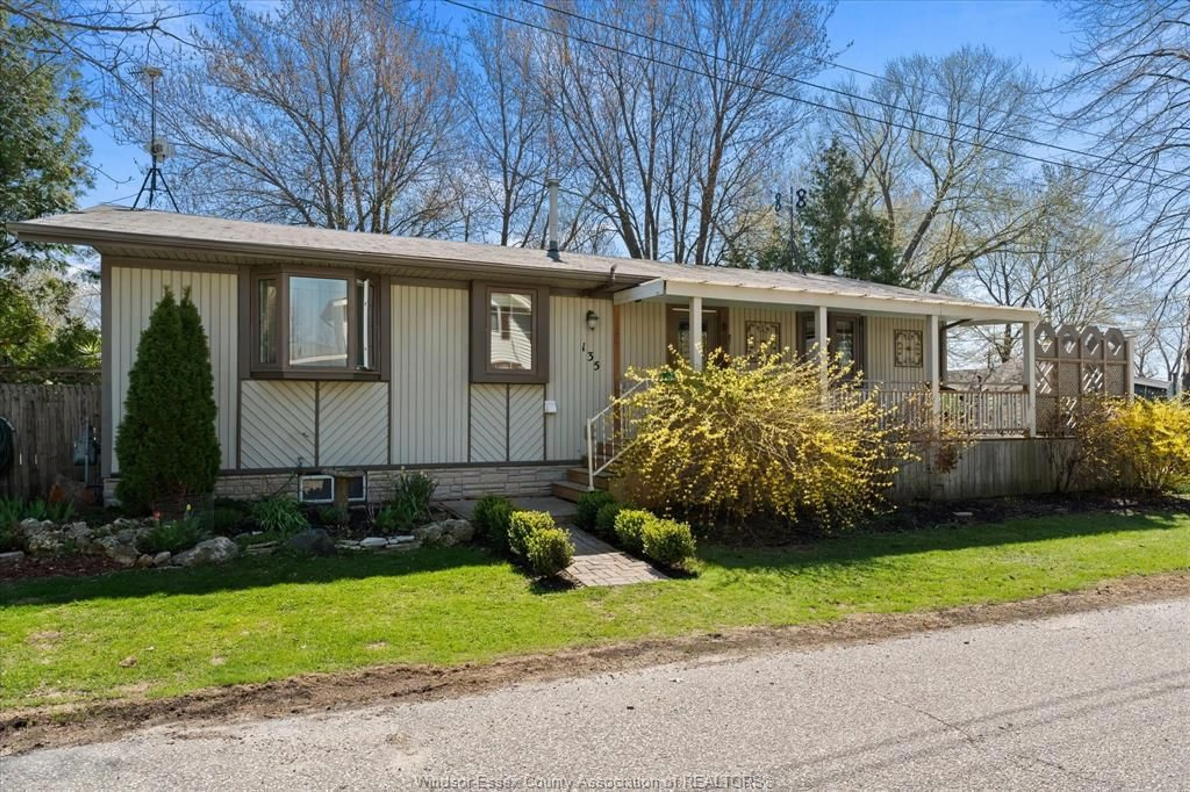 Home with vinyl exterior material, street for 135 ESSEX Blvd, Amherstburg Ontario N9V 2Y8