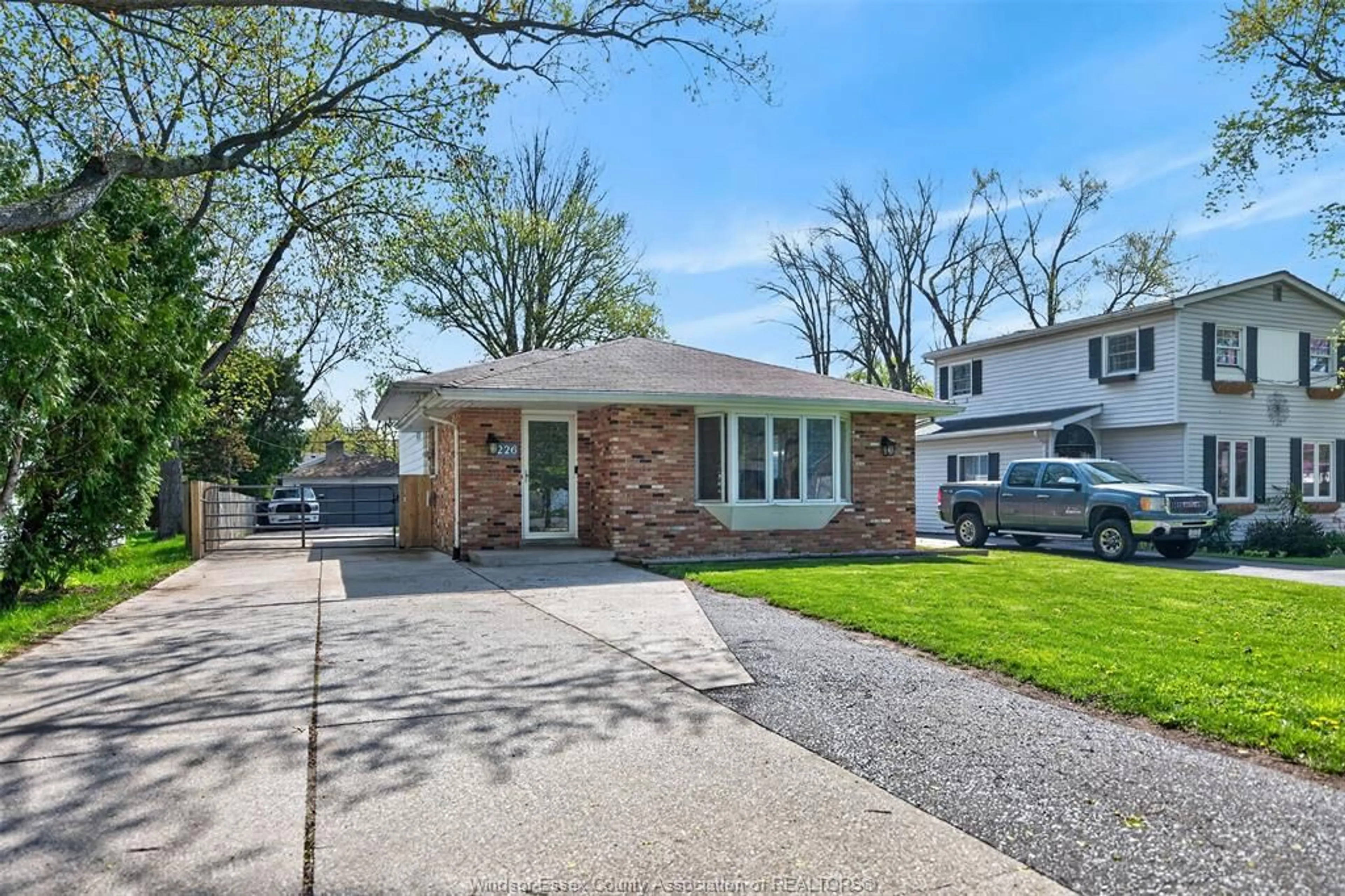 Home with brick exterior material, street for 226 EDGEWATER Blvd, Tecumseh Ontario N8N 2H2