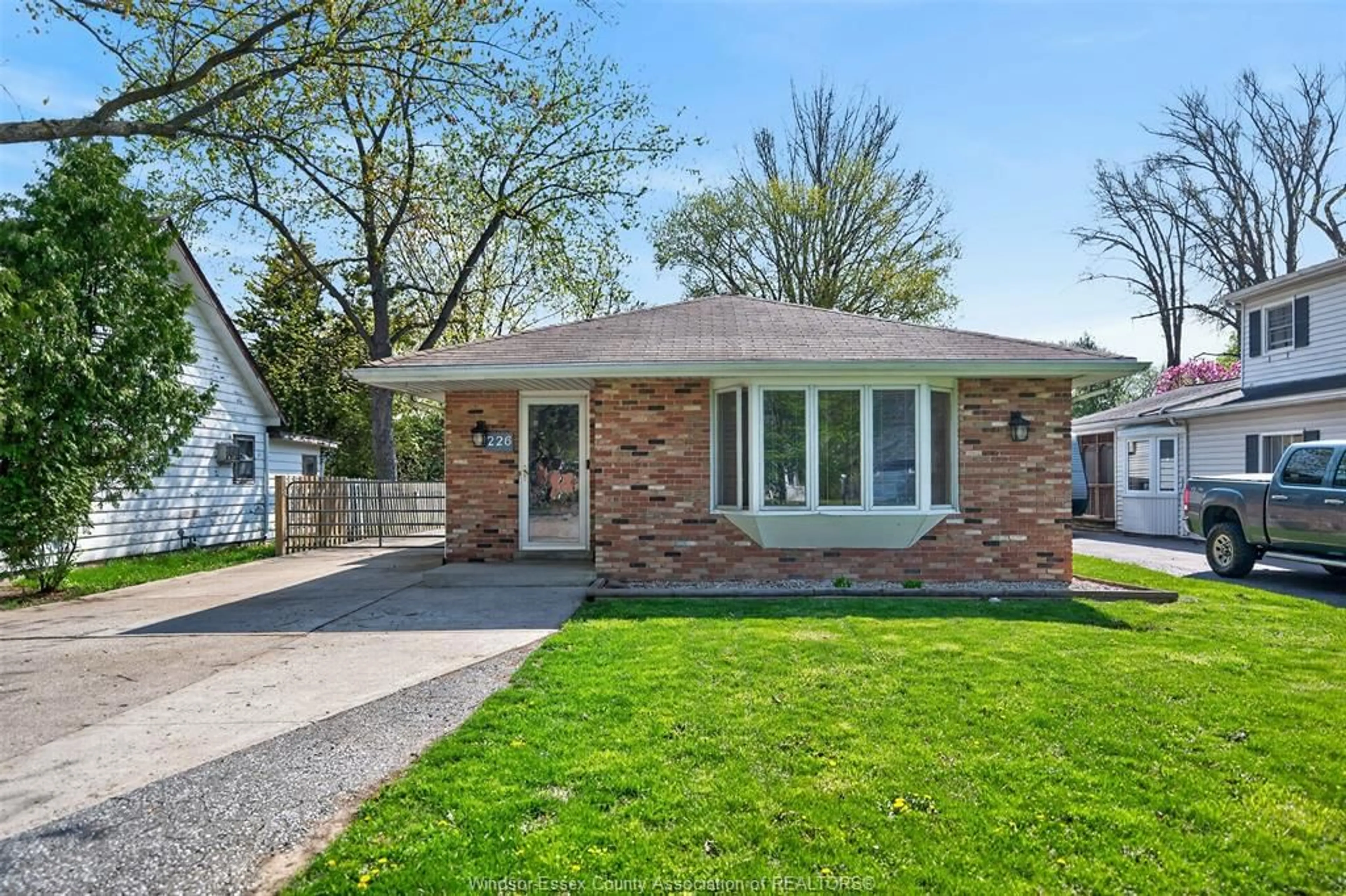 Home with brick exterior material, street for 226 EDGEWATER Blvd, Tecumseh Ontario N8N 2H2