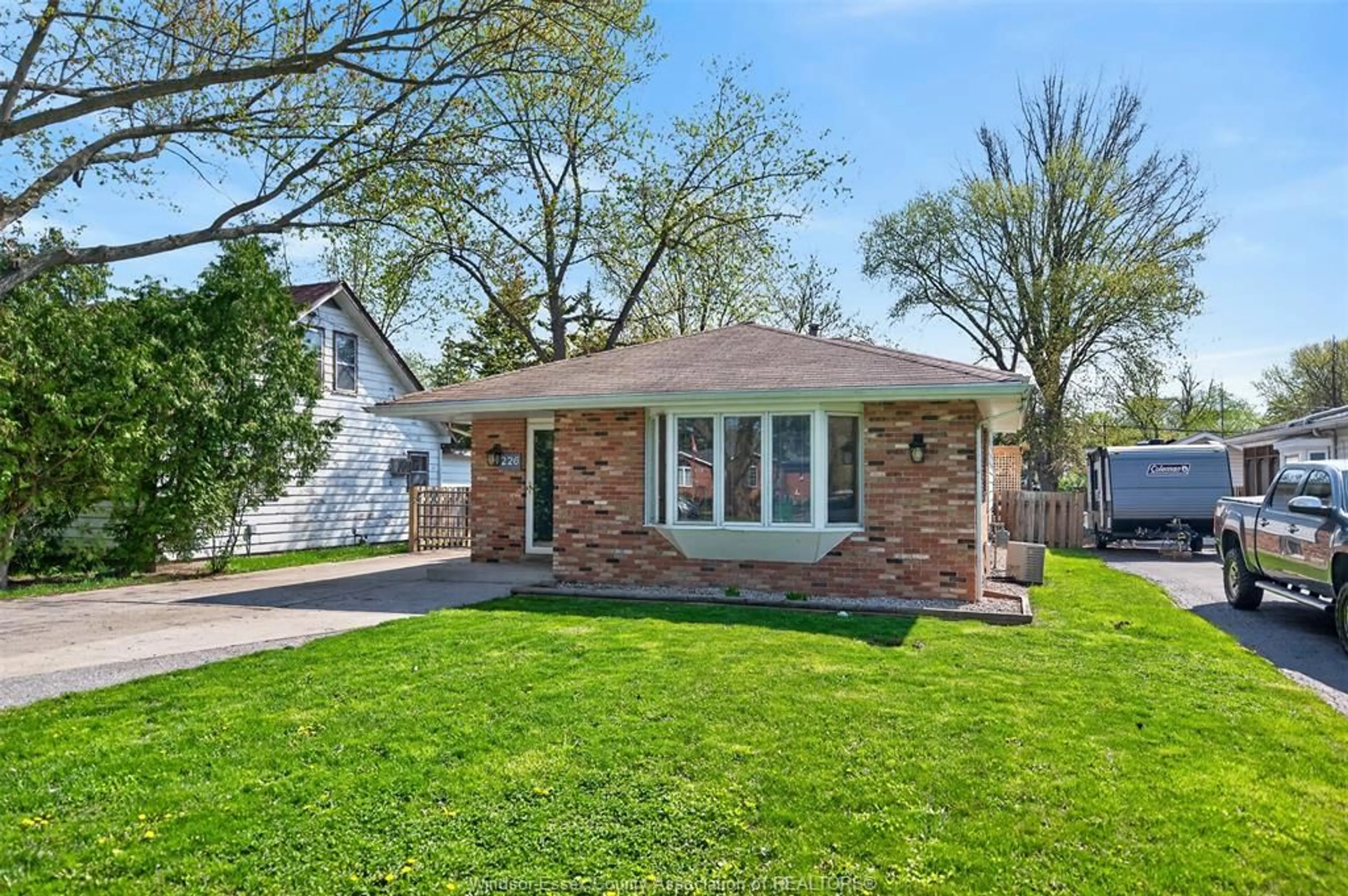 Home with brick exterior material, street for 226 EDGEWATER Blvd, Tecumseh Ontario N8N 2H2