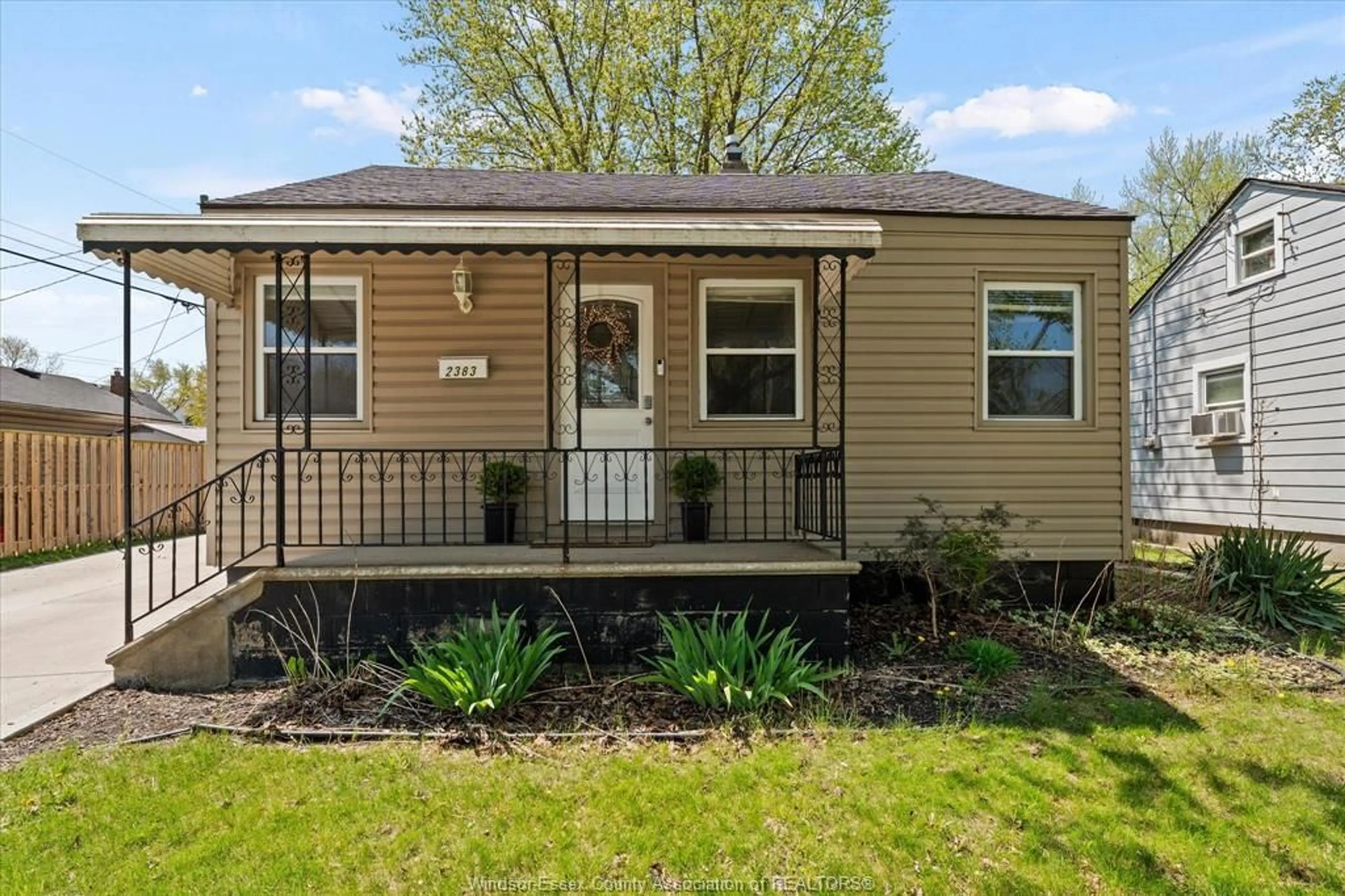 Home with vinyl exterior material, street for 2383 ELSMERE, Windsor Ontario N8W 2C9