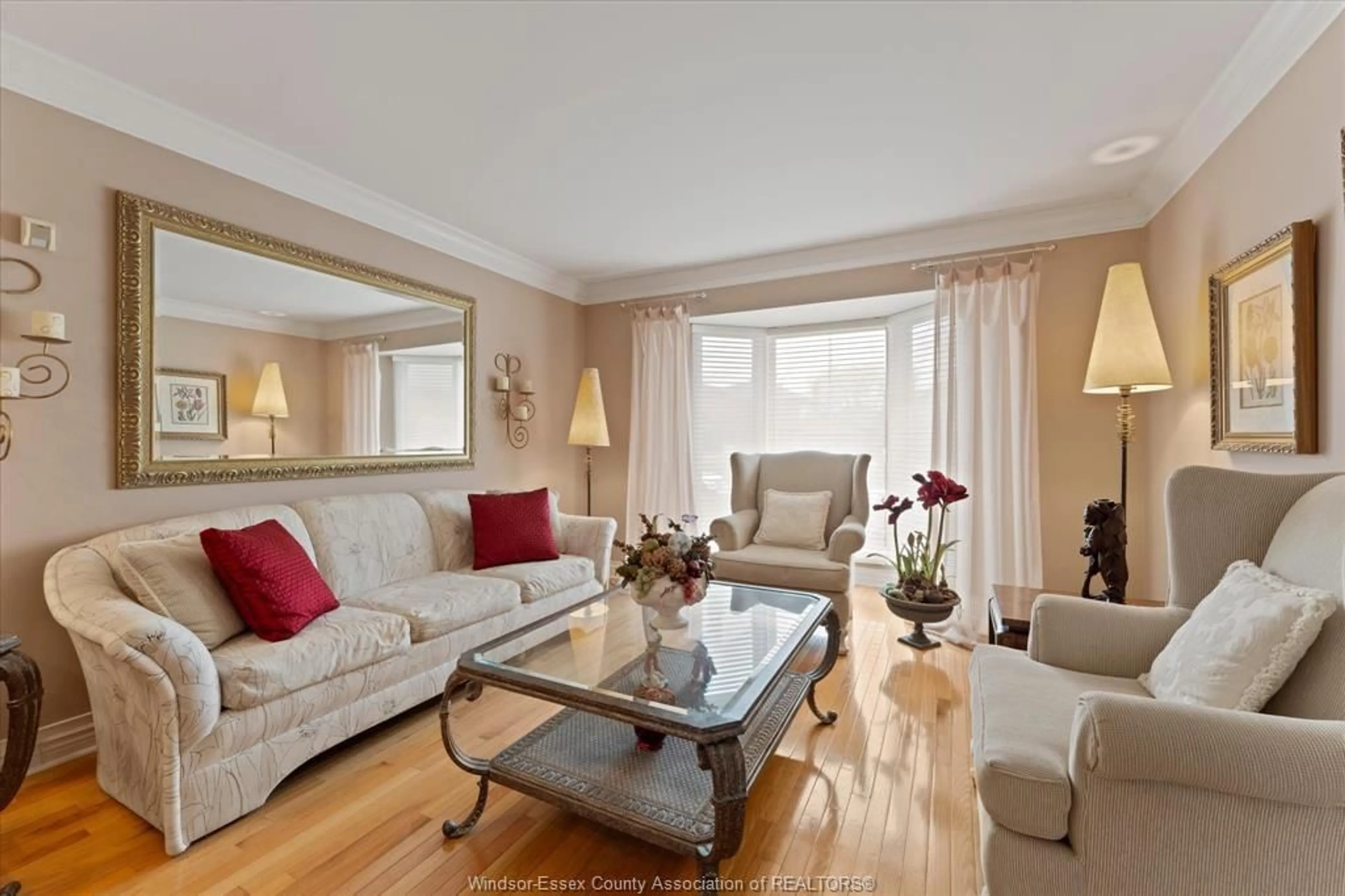 Living room with furniture, wood/laminate floor for 268 MAJESTIC Dr, Lakeshore Ontario N8N 4K7