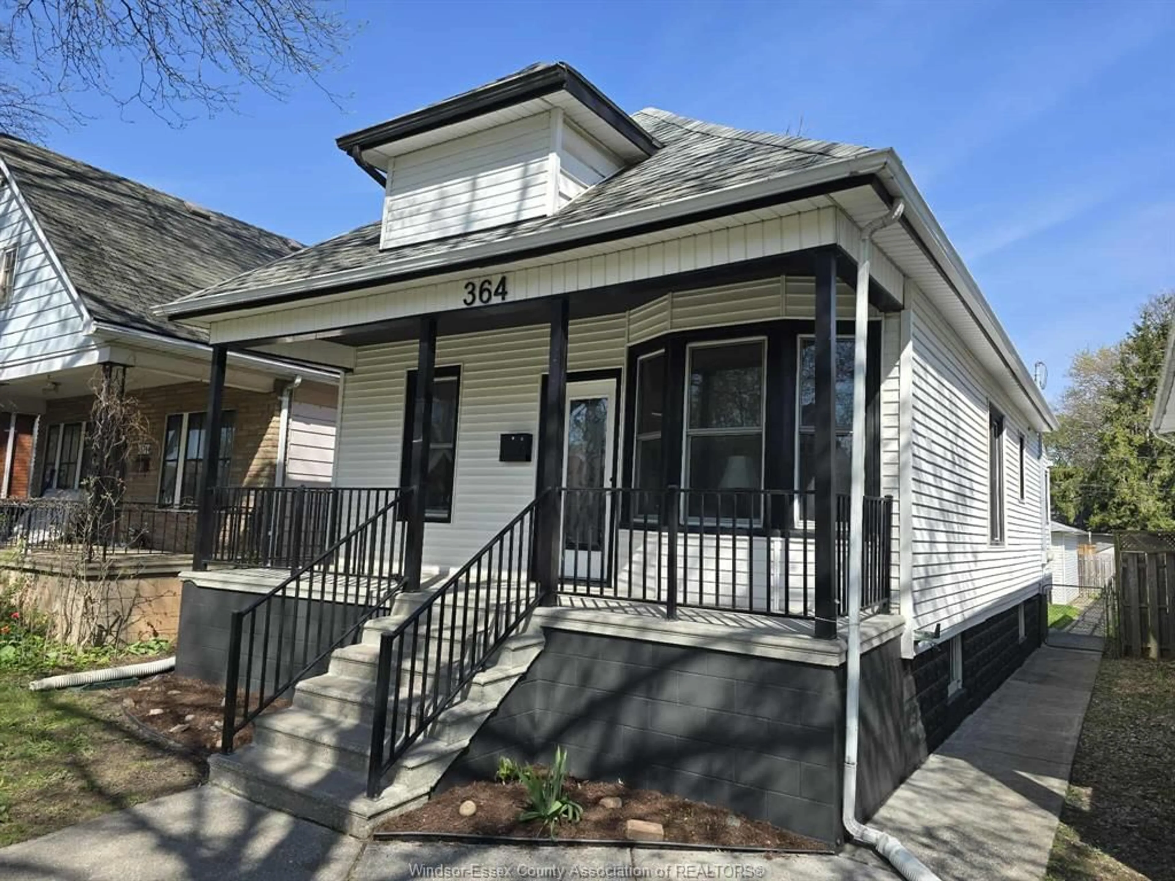 Home with vinyl exterior material, street for 364 CLINTON St, Windsor Ontario N8X 1A6