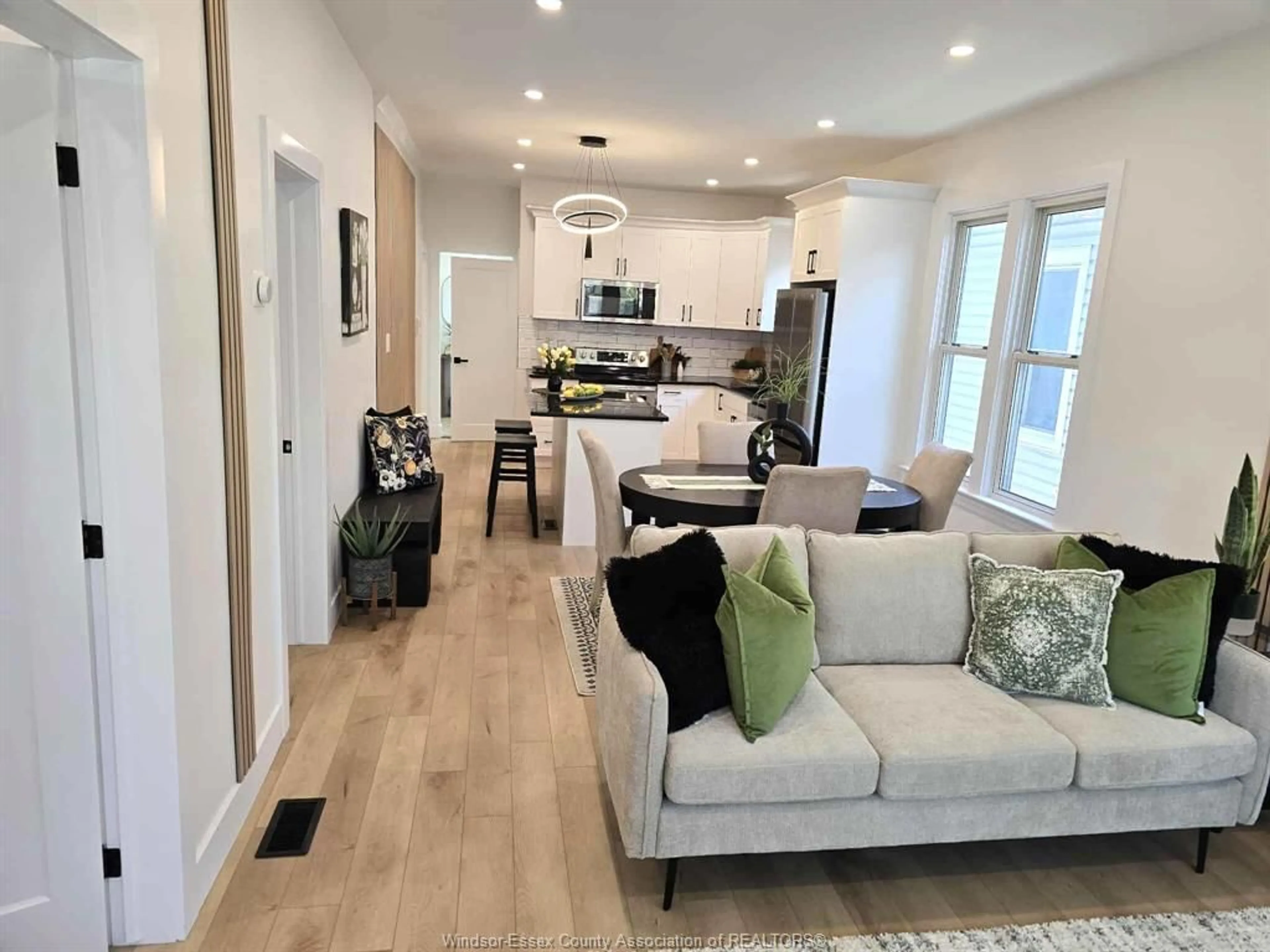 Living room with furniture, wood/laminate floor for 364 CLINTON St, Windsor Ontario N8X 1A6