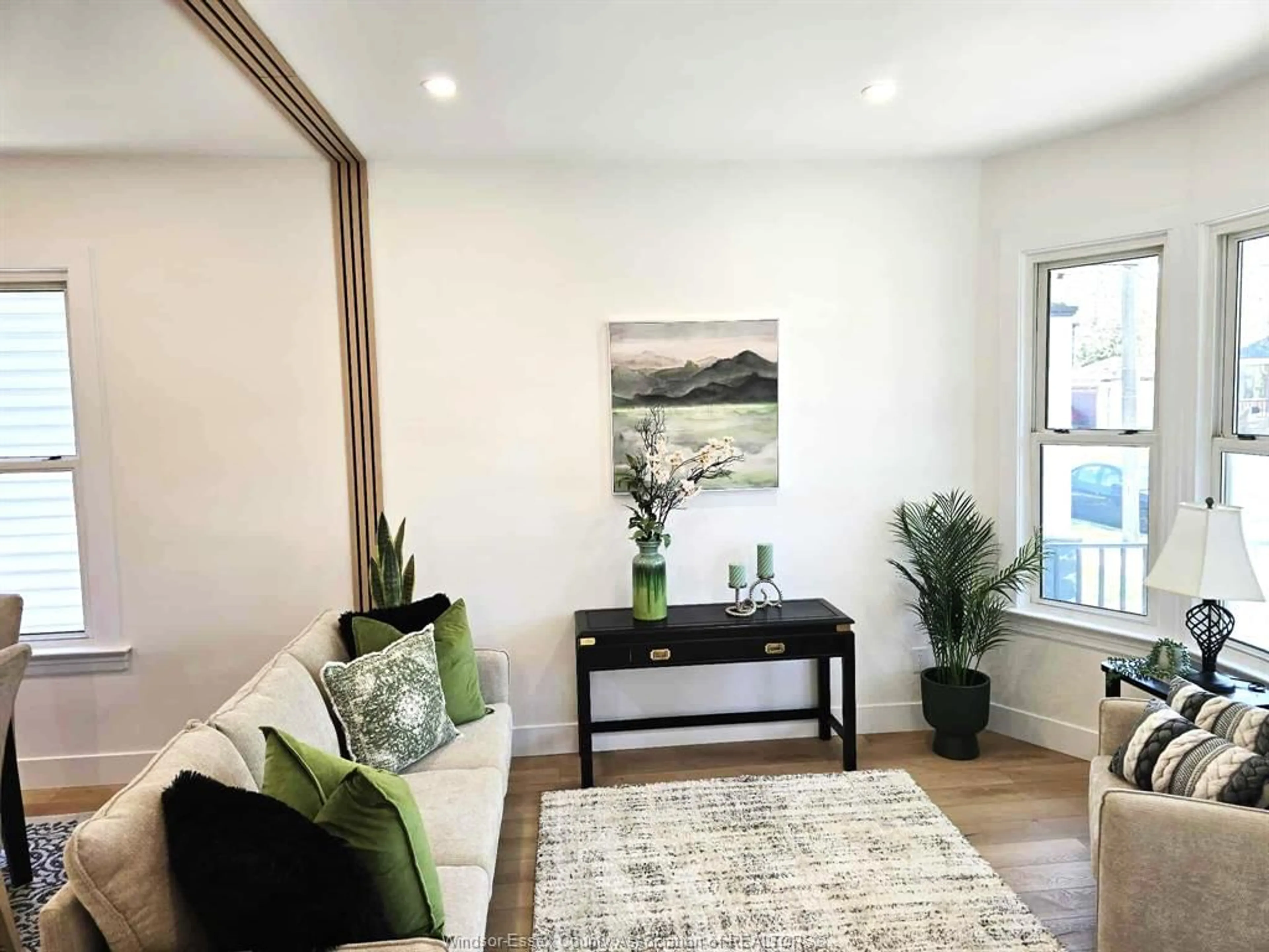 Living room with furniture, wood/laminate floor for 364 CLINTON St, Windsor Ontario N8X 1A6