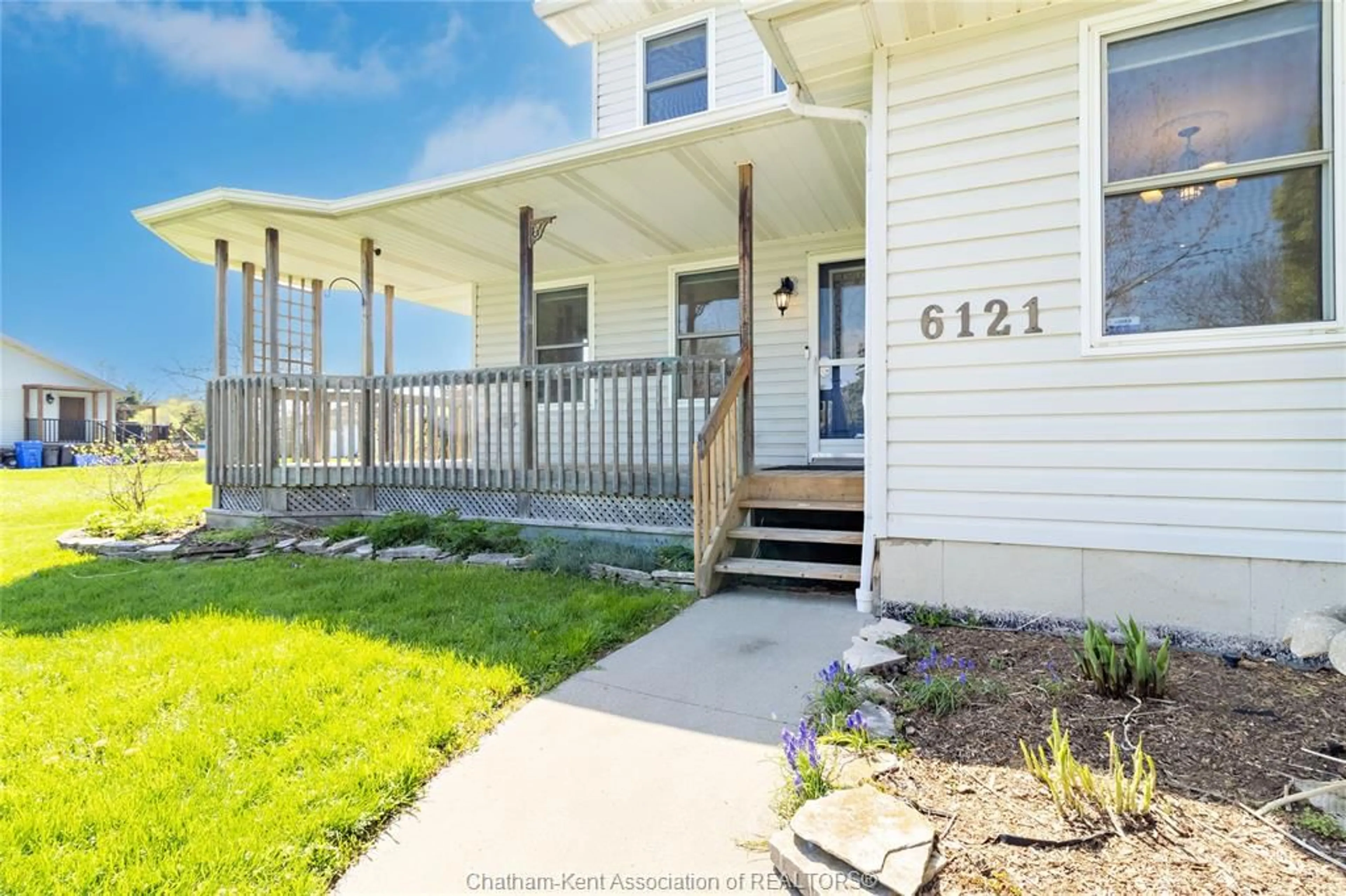 Home with vinyl exterior material, street for 6121 Emerson Ave, Comber Ontario N0P 1J0