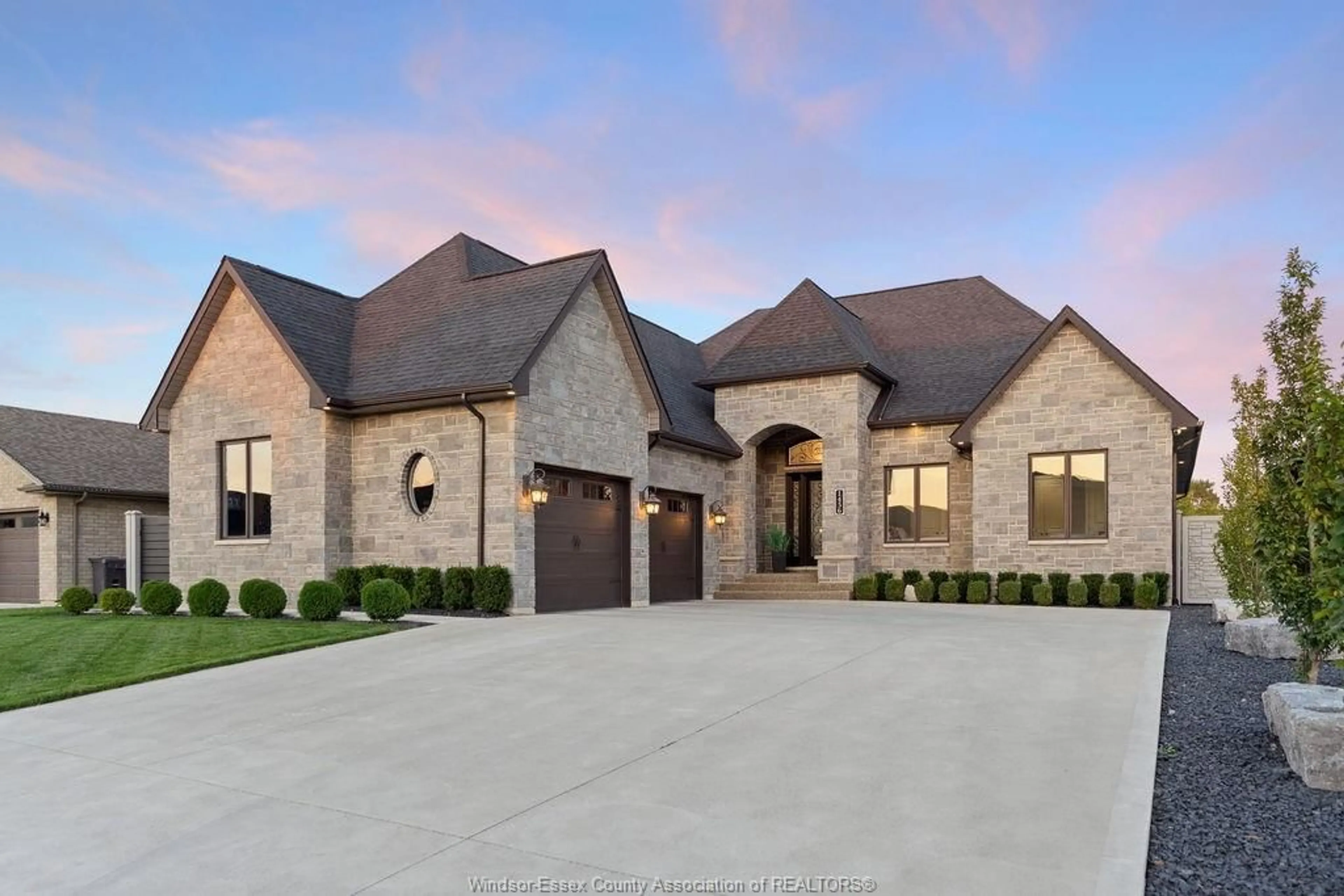 Home with brick exterior material, street for 1456 MULLINS Dr, Lakeshore Ontario N0R 1V0