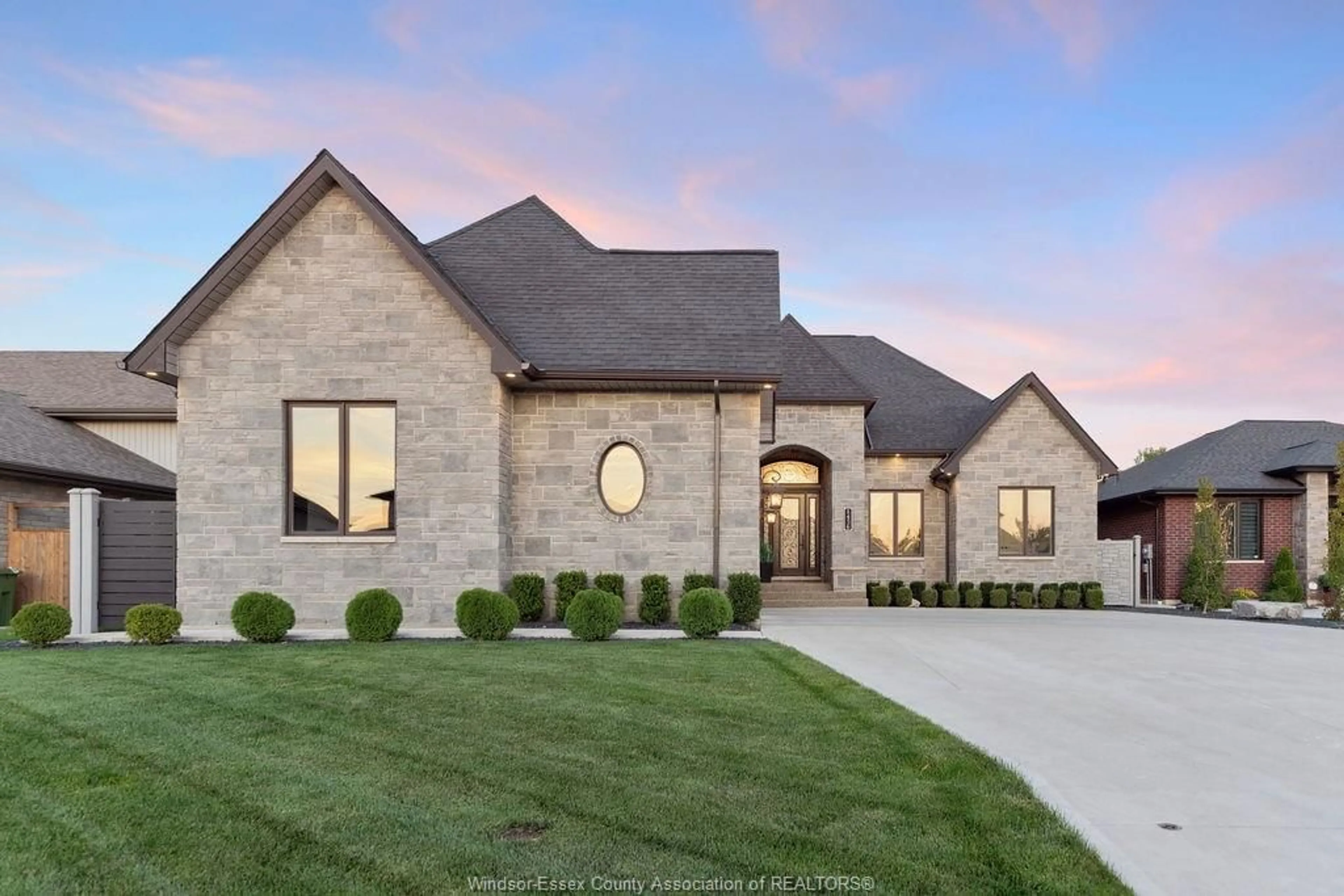 Home with brick exterior material, street for 1456 MULLINS Dr, Lakeshore Ontario N0R 1V0